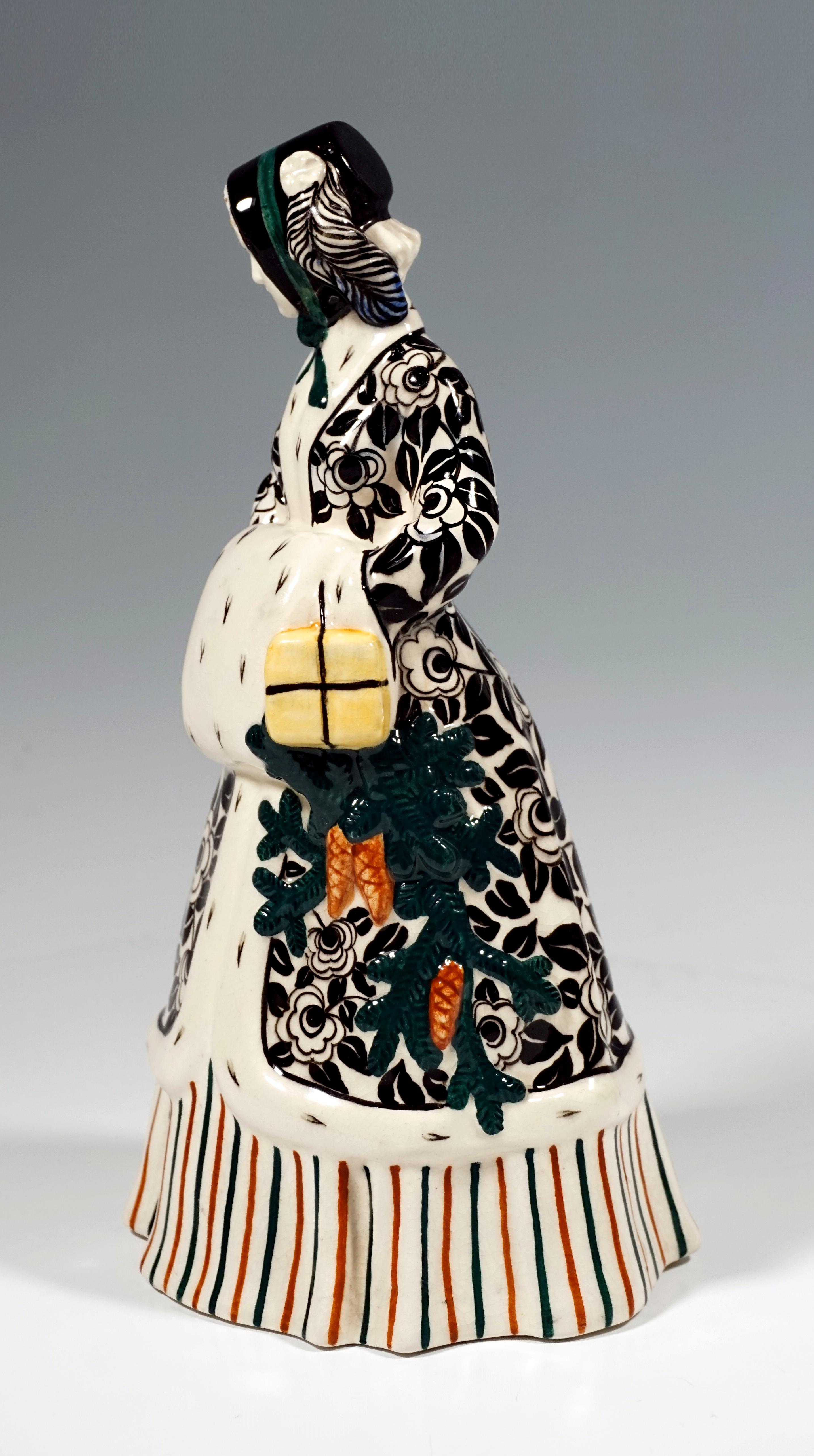 Pedestal-less crinoline figure with floor-length, three-colored, longitudinally striped skirt, over it a coat decorated with an elaborate floral pattern and trimmed with ermine, warming her hands in an ermine muff held in front of her at hip height.