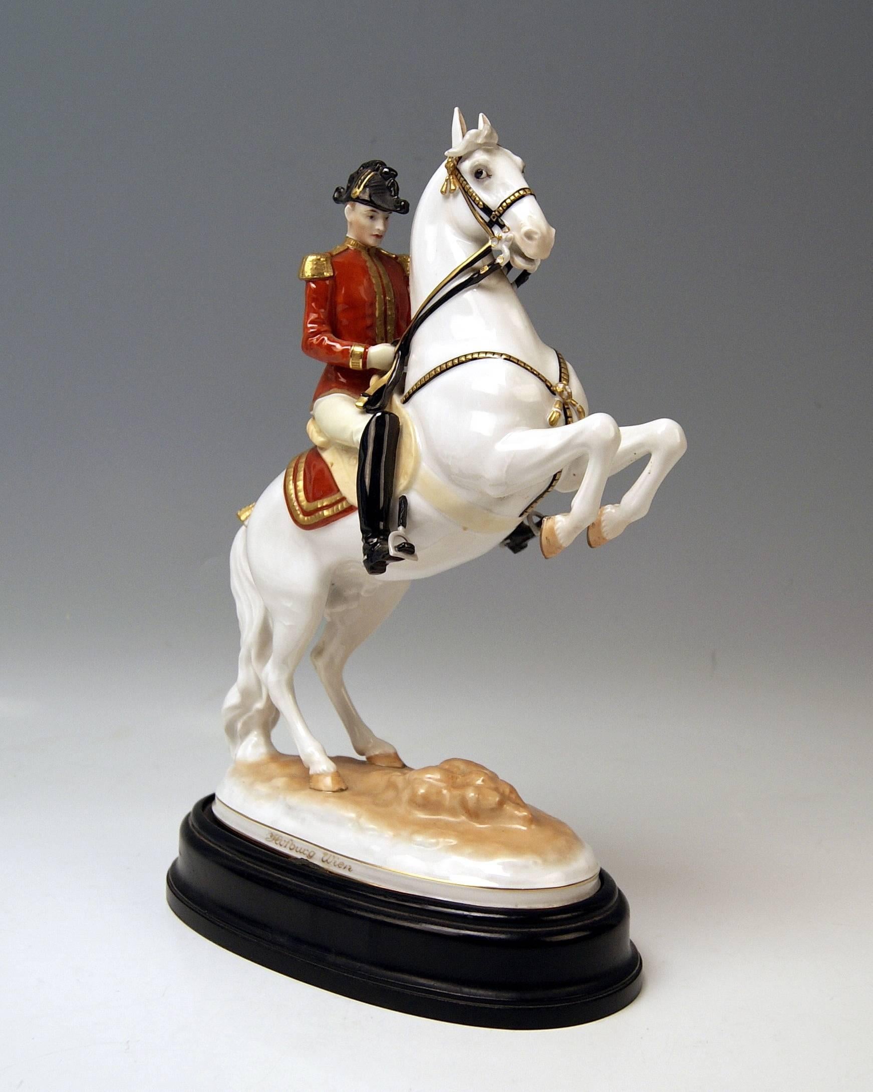 Vienna Augarten Horse Spanish Riding School
Figurine type: Courbette
The model was created by Prof. Albin Döbrich, circa 1926

The rider- conducting the horse by the reins- sits on the jumping white Lipizzan which is rearing up. The jumping