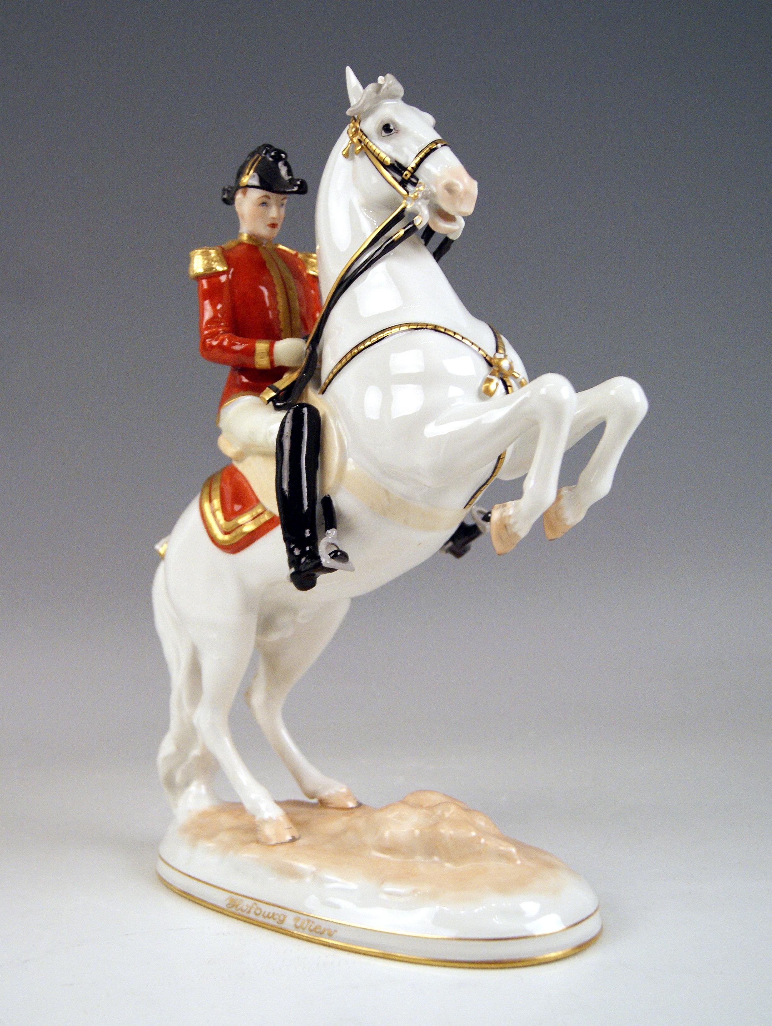 Vienna Augarten Horse Spanish Riding School
Figurine Type: Courbette

The rider - conducting the horse by the reins - sits on the jumping white Lipizzan which is rearing up. 
The jumping horse depicts a figurine which is called 