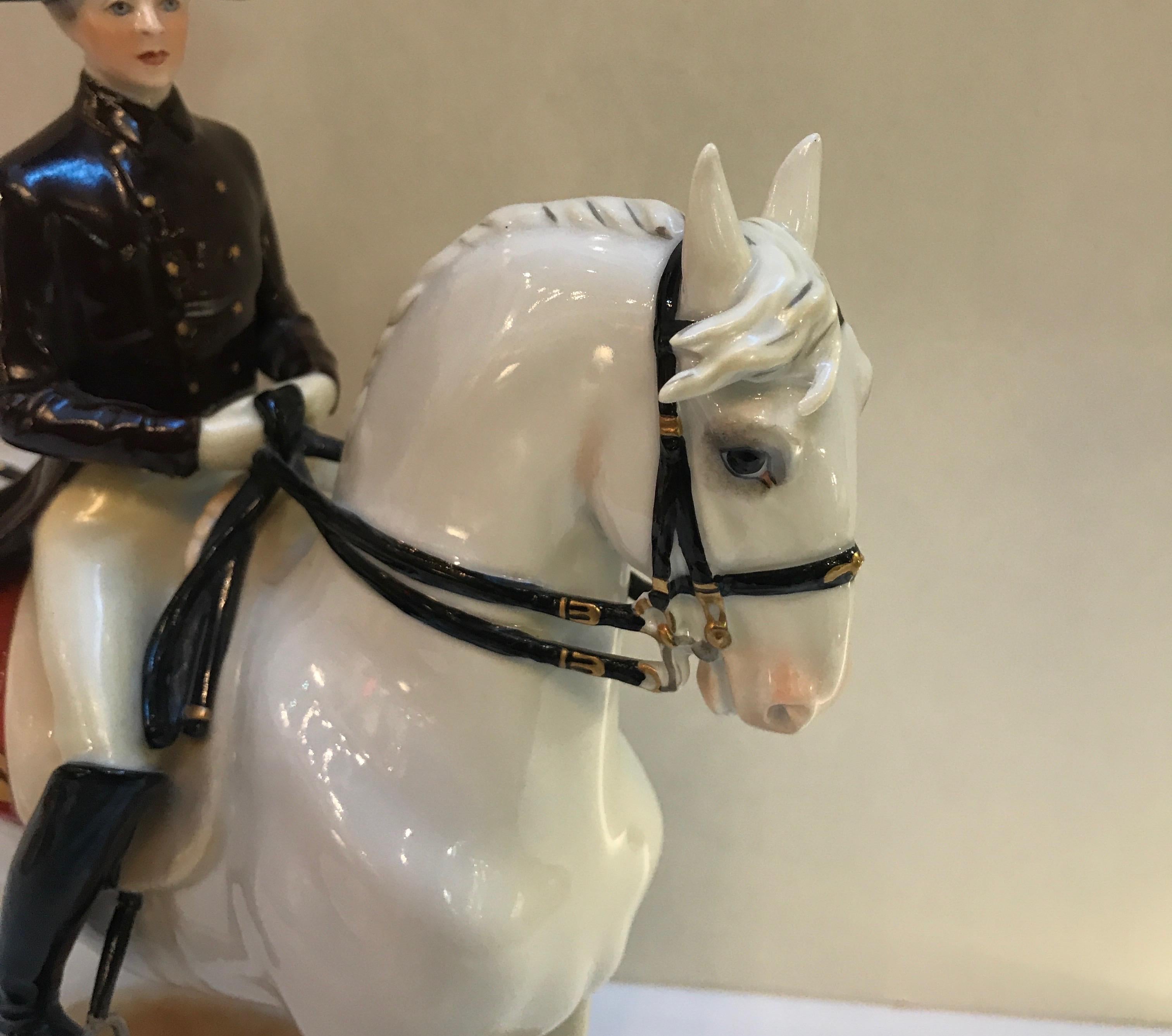 Vienna Augarten Horse Spanish Riding School
Figurine type: Piaffe

The piaffe is a dressage movement where the horse is in a highly collected and cadenced trot, in place or nearly in place. The center of gravity of the horse should be more