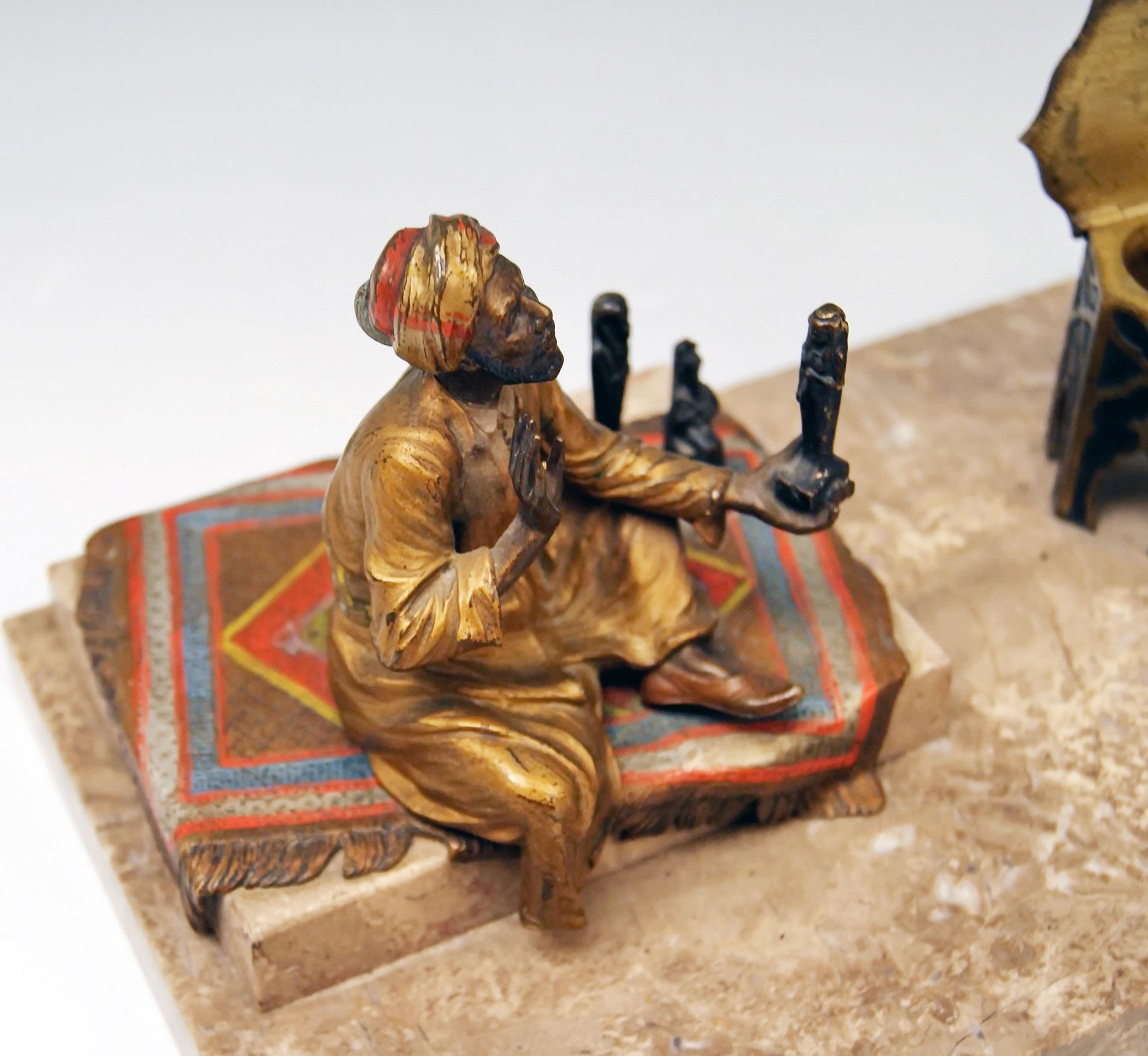 Cold-Painted Vienna Bergman Bronze Arab Man on Carpet Selling Egypt Antiquities, circa 1890 For Sale