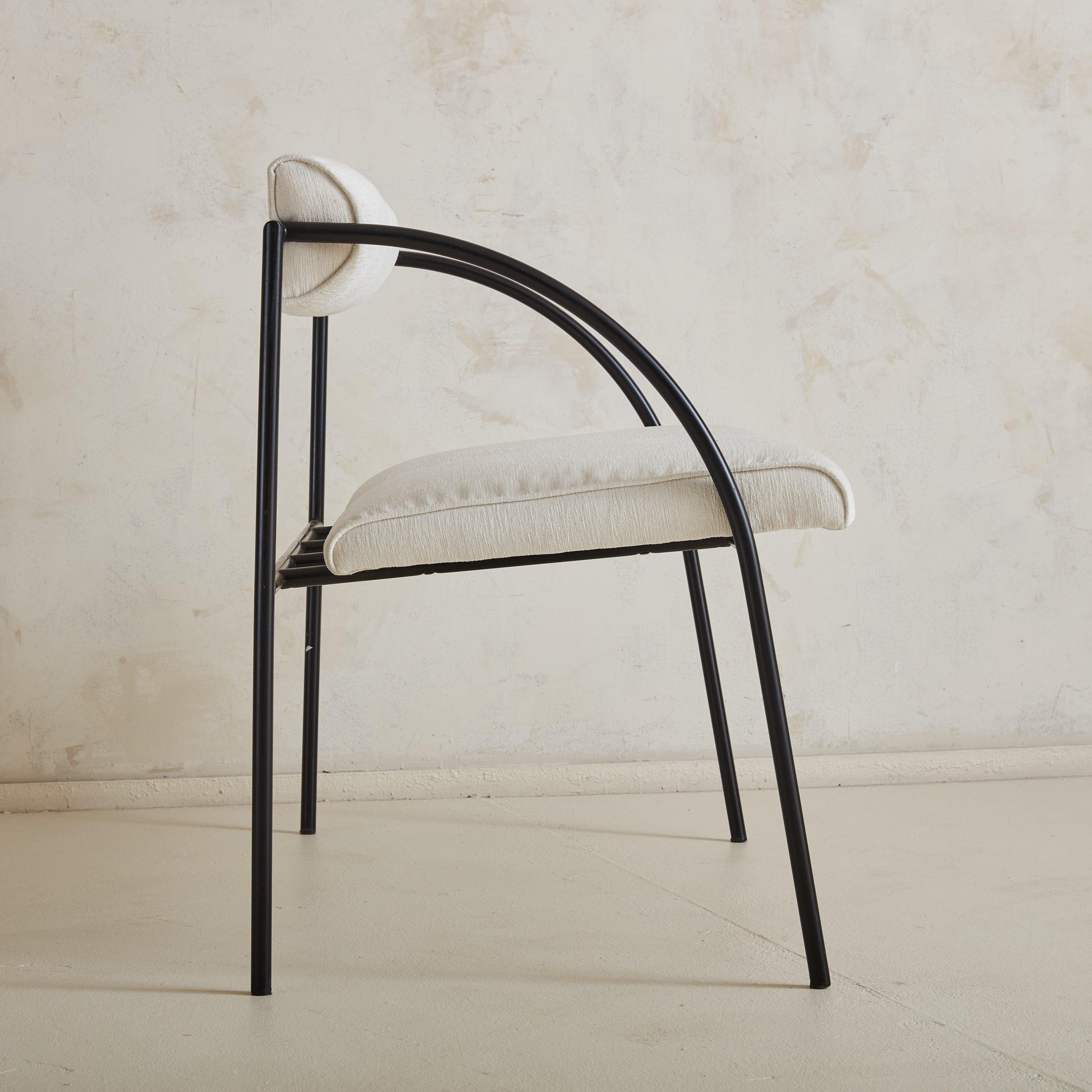 A pair of Postmodern ‘Vienna’ settees designed by Rodney Kinsman for Italian manufacturer Bieffeplast, Padova in the 1980s. These sculptural settees feature tubular black metal frames with dramatic curved-profile arms. The petite, half-round