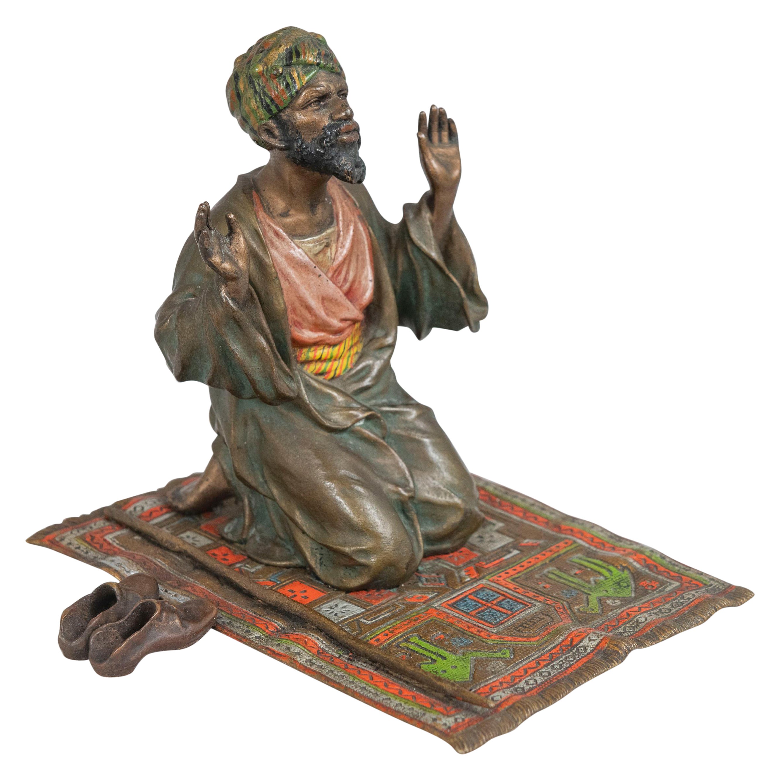 Vienna Bronze Cold Painted Man Praying on Rug, Bergmann Foundry, ca. 1910