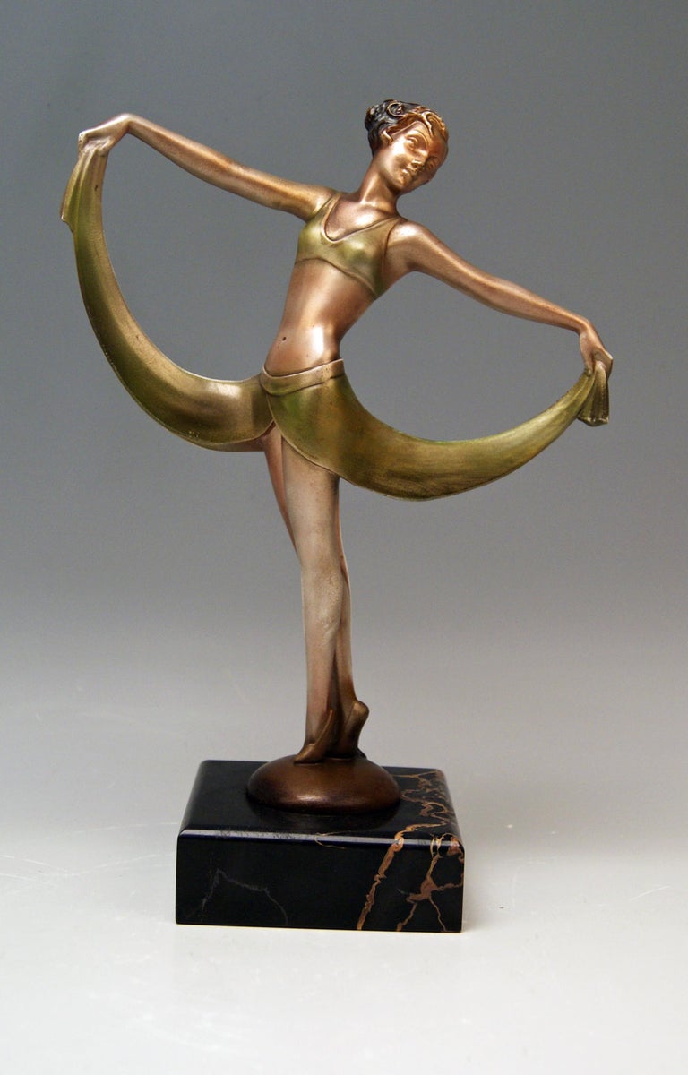 Vienna bronze finest Art Deco lady dancer.

Technique:
Bronze casting / mold
cold painted

Designed by Josef Lorenzl (1892 - 1950) / one of most important designers having been active for Goldscheider manufactory as well as for Vienna Bronze