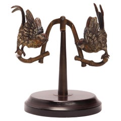 Antique Vienna bronze sculpture depicting a swing with two parrots, Austria 1890. 