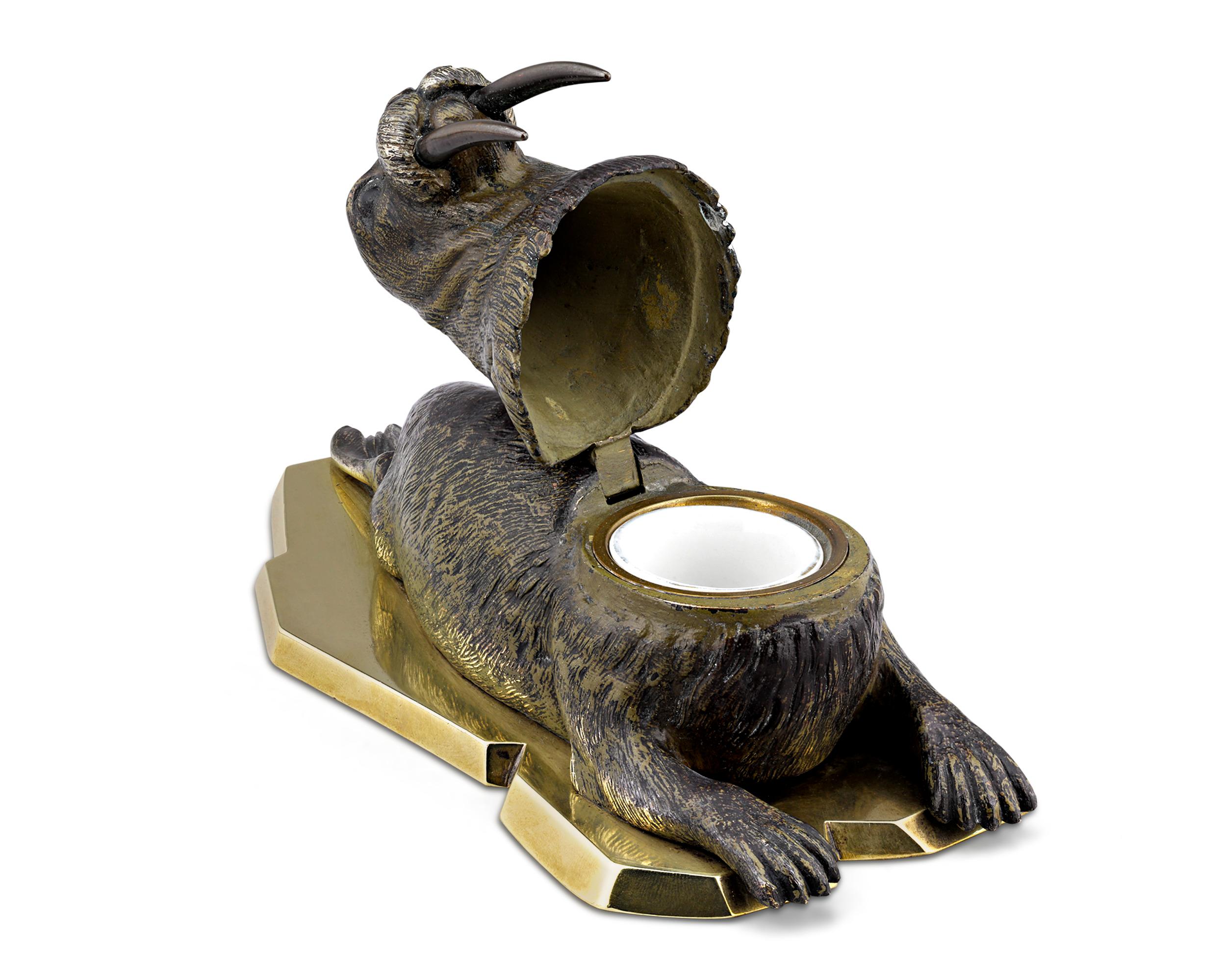 Wonderfully charming and boasting a high level of detail, this bronze walrus also serves as an inkwell. The incredible artistry of Viennese bronze work is on display in this delightful figure, with its mighty tusks, exquisitely detailed coat, and
