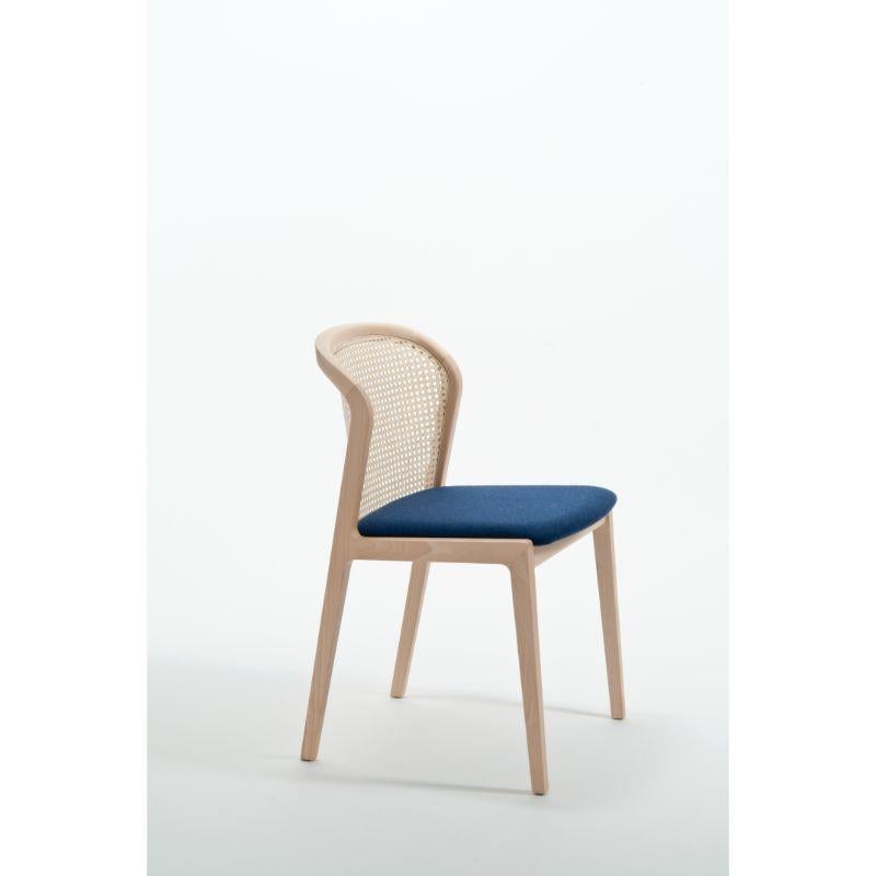Vienna chair, natural beech wood, and nord wool - blue by Colé Italia with Emmanuel Gallina
Dimensions: H 78, W 48, D 50 cm
Materials: natural beechwood chair with straw back and upholstered seat.

Also available: Vienna Canaletto, Vienna Little