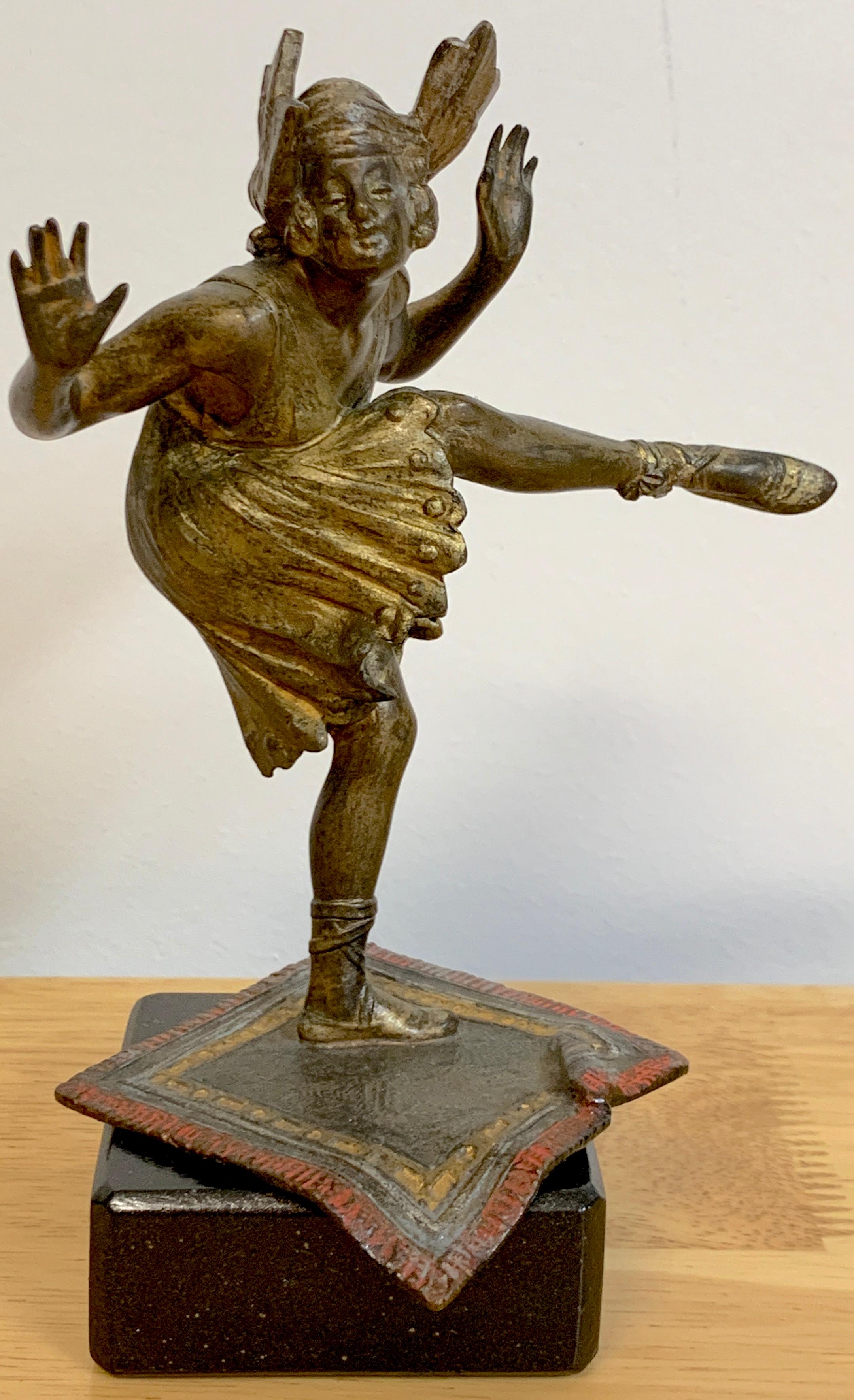 Vienna cold painted bronze dancing flapper, attributed to Bergman 
Fantastically modeled and painted, beautifully patinated surface, unsigned
This work stands 6.5-inches high x 3-inches wide x 3-inches deep.