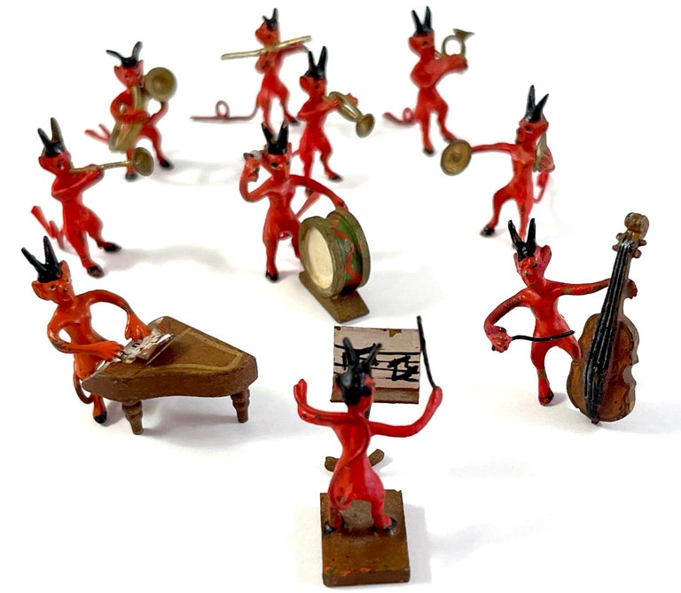 Vienna Cold Painted Bronze Ten Piece Devil Band, After Franz Bergman 
Austria, Post WWII, Style of Franz Bergman, Unmarked
A rare and amusing work consisting of ten individually cast, modeled, hand painted bronze figures of devils, each one with