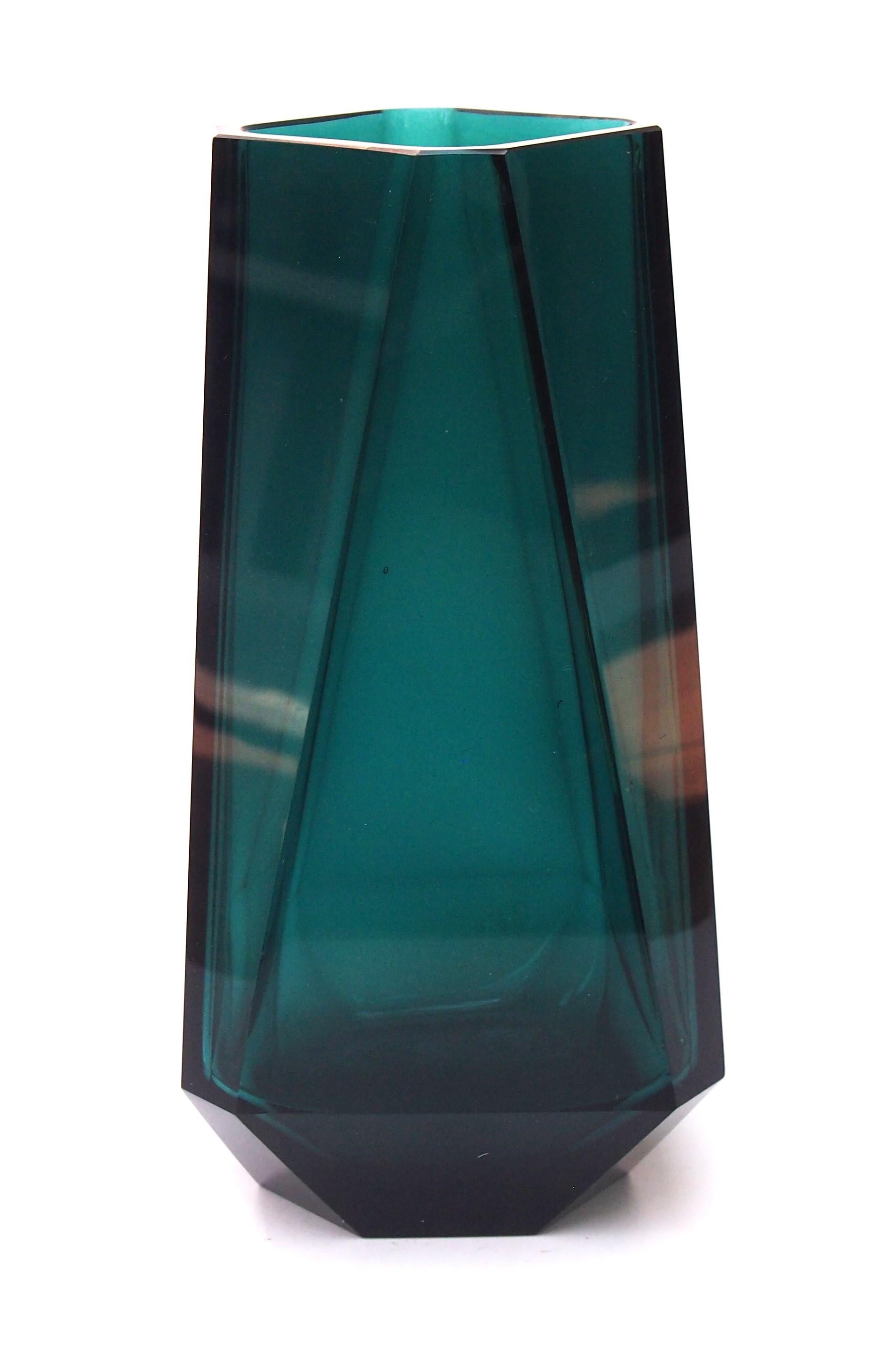 A fabulous green/ blue 'Vienna cut' jewel vase by Moser - a large brightly coloured and geometrically faceted vase in the style that later became known as Vienna cut -these vases were designed and made to look like giant jewels -and are very