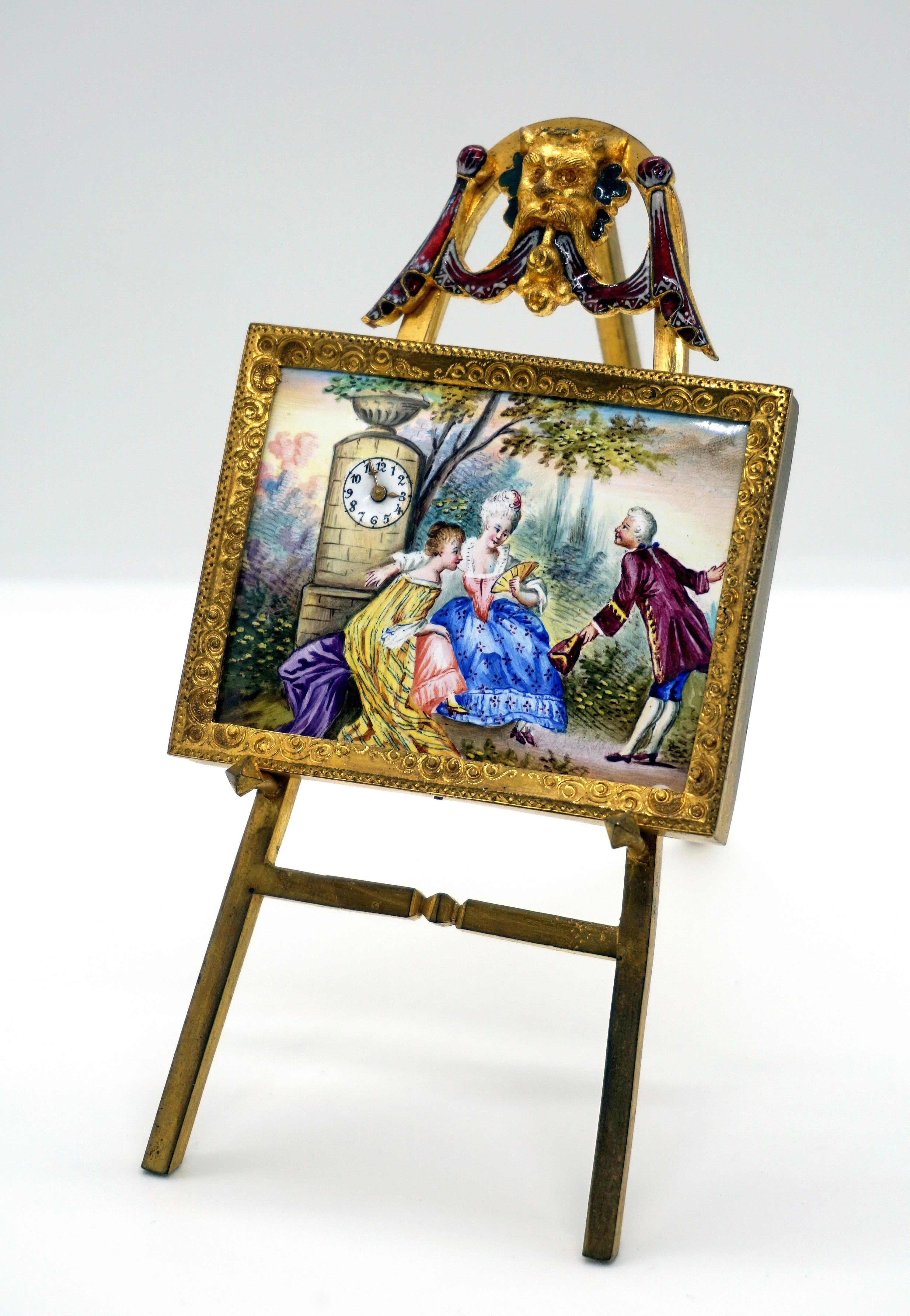 Exquisite Vienna enamel picture clock from the period circa 1880

Casing made of brass. On the front polychrome enamel painting - Watteau scenery: A gallant gentleman courting two ladies sitting in front of a column on the edge of the path, in