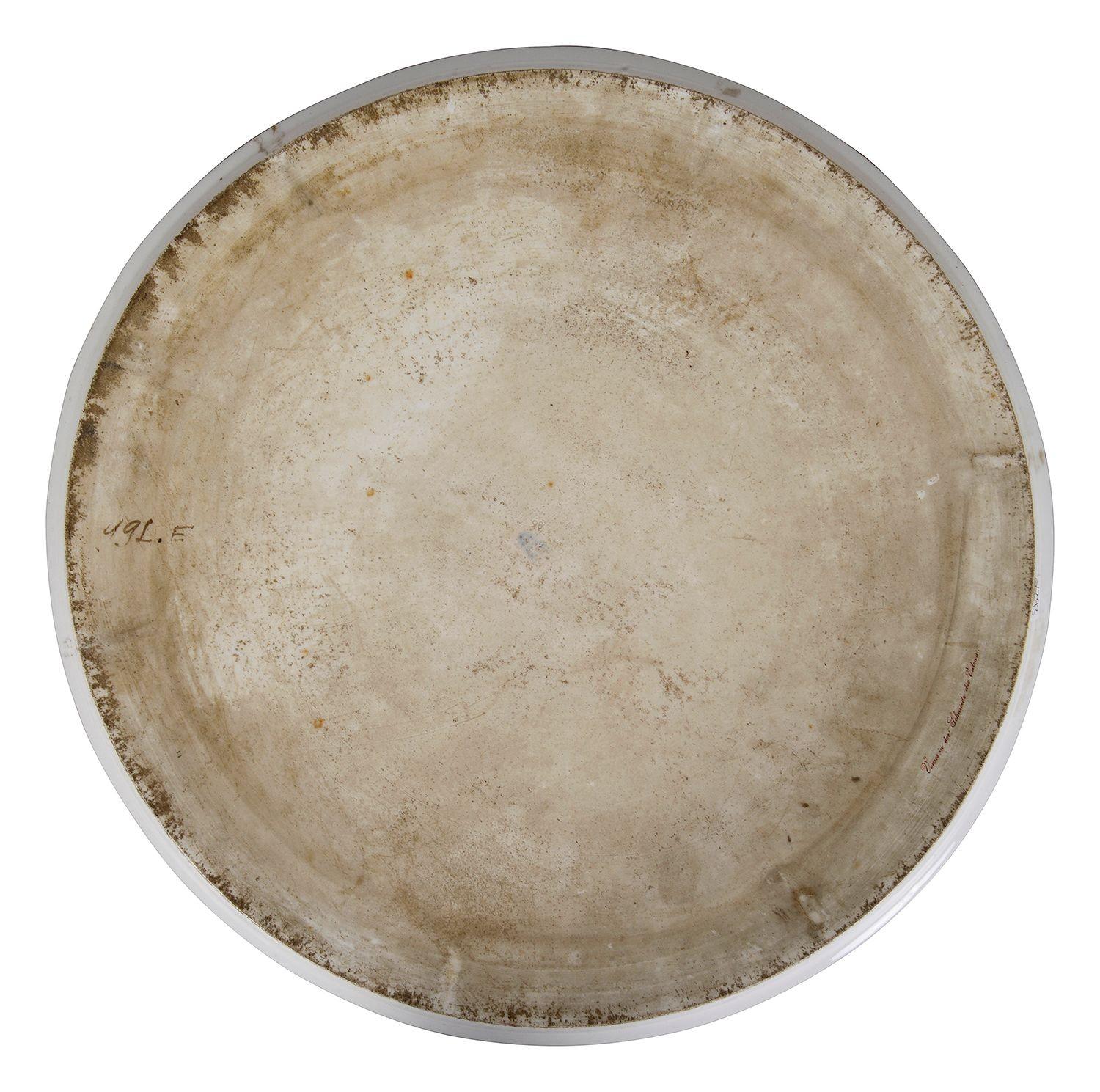Porcelain Vienna porcelain charger depicting 'Venus in the Forge of Vulcan', 40cm dia For Sale