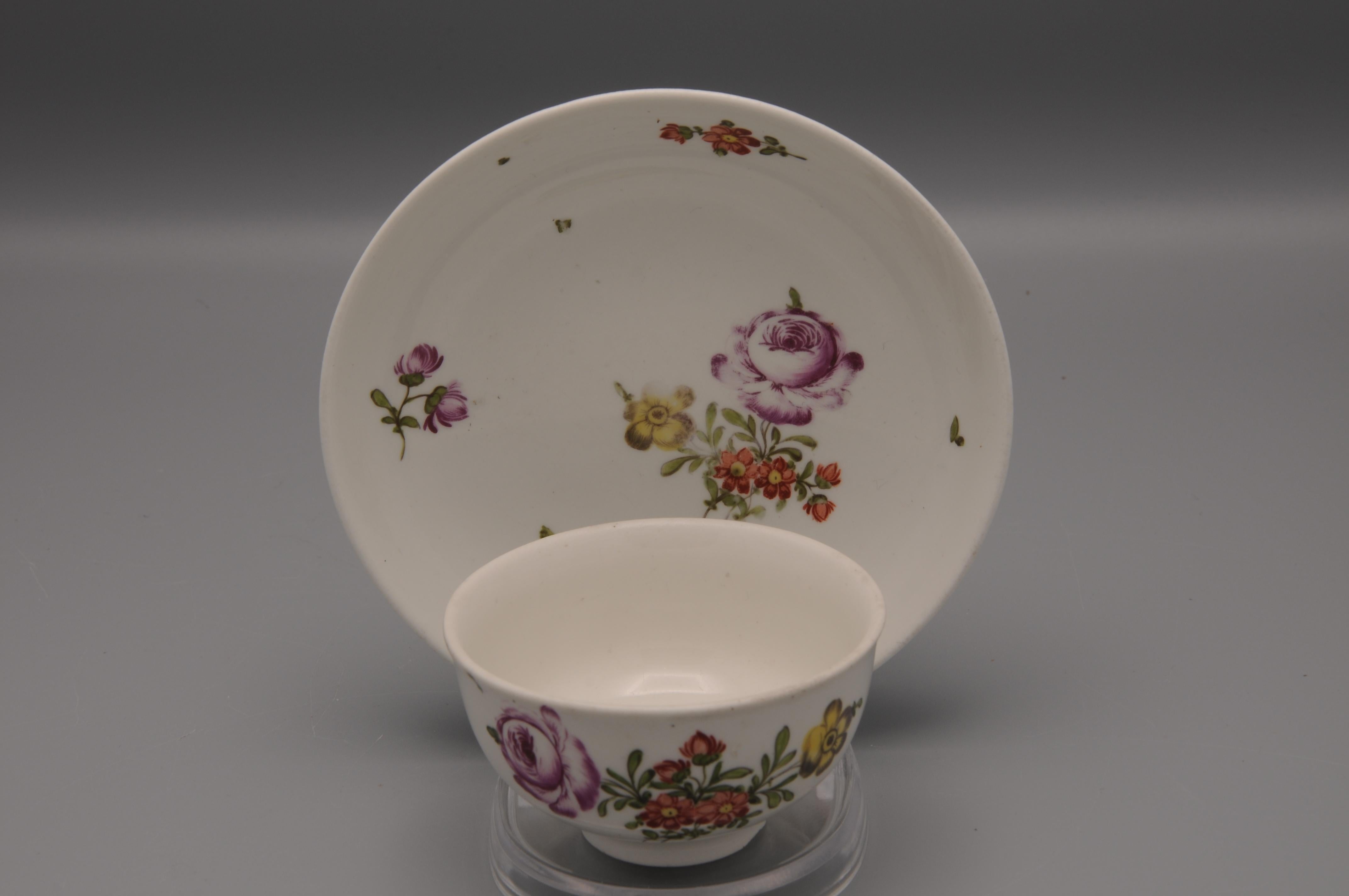 Vienna Porcelain Coffee or Mokka Cup and Saucer with floral decoration.

Product of the Vienna Porcelain Manufactory (German: Kaiserlich privilegierte Porcellain Fabrique), a porcelain manufacturer in Alsergrund in Vienna, Austria. It was founded in