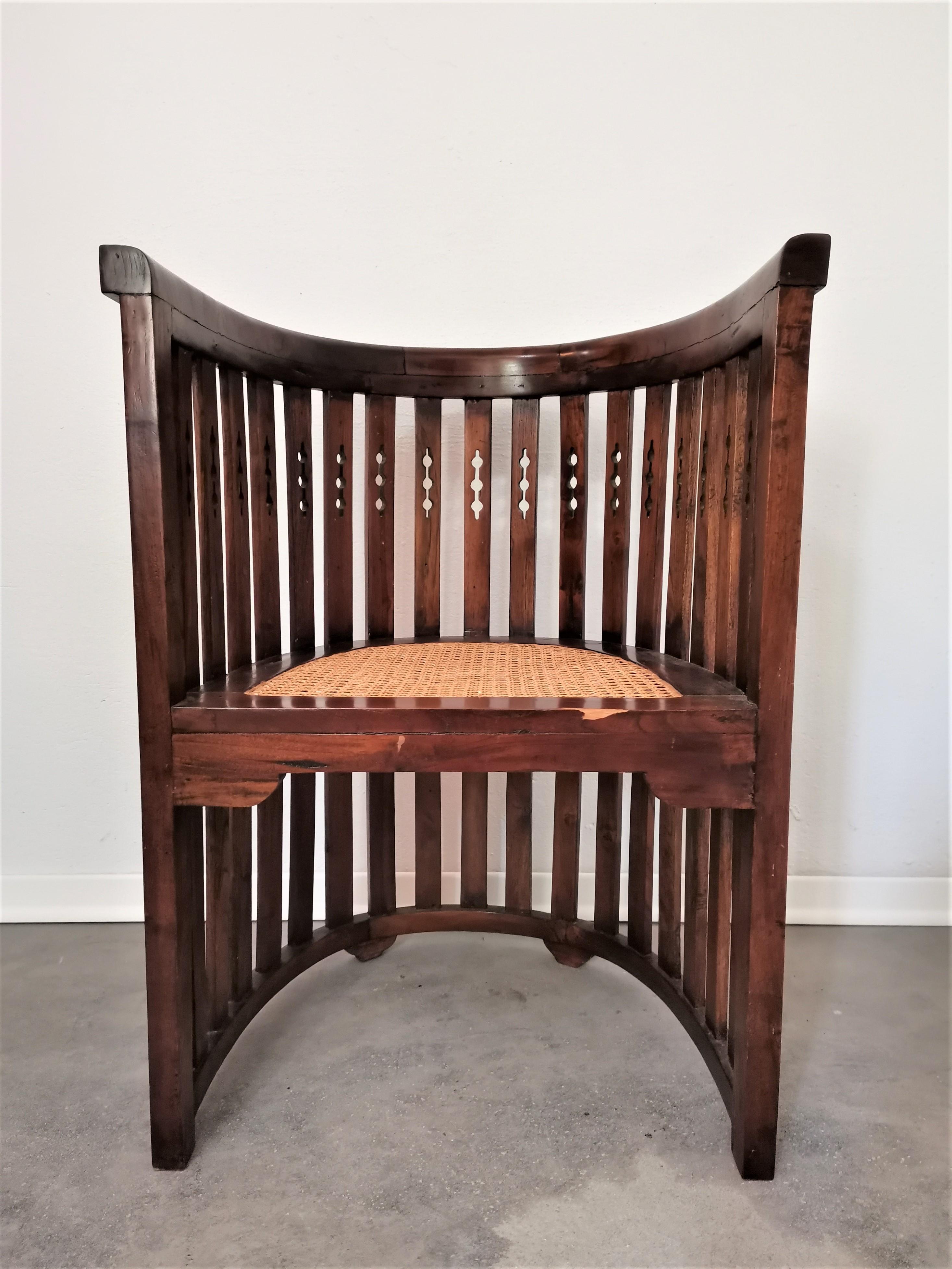 Vienna Secession Armchair

Period: 1920s

Designer: Joseph Hoffman style

Country of Manufacturer: Austria

Materials: wood, cane

Colours: brown, walnut

Condition: very good vintage condition, traces of use and age, small part missing