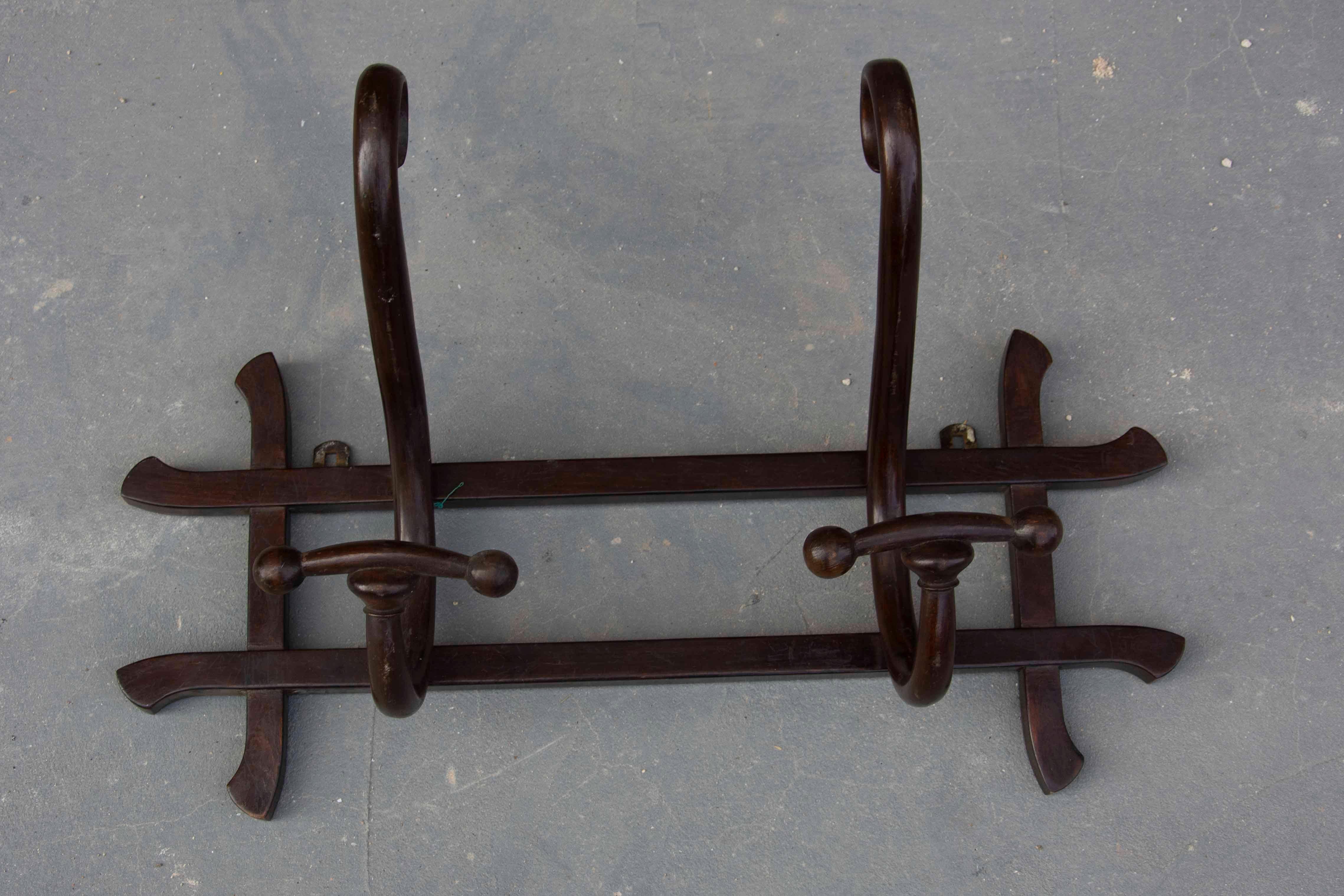 Original Austrian Art Nouveau bentwood wall coat rack by Thonet. Seldom-seen piece. It was made in Vienna, circa 1900. 
The Thonet brand is embossed on the back. The coat hanger is in a very good vintage state.