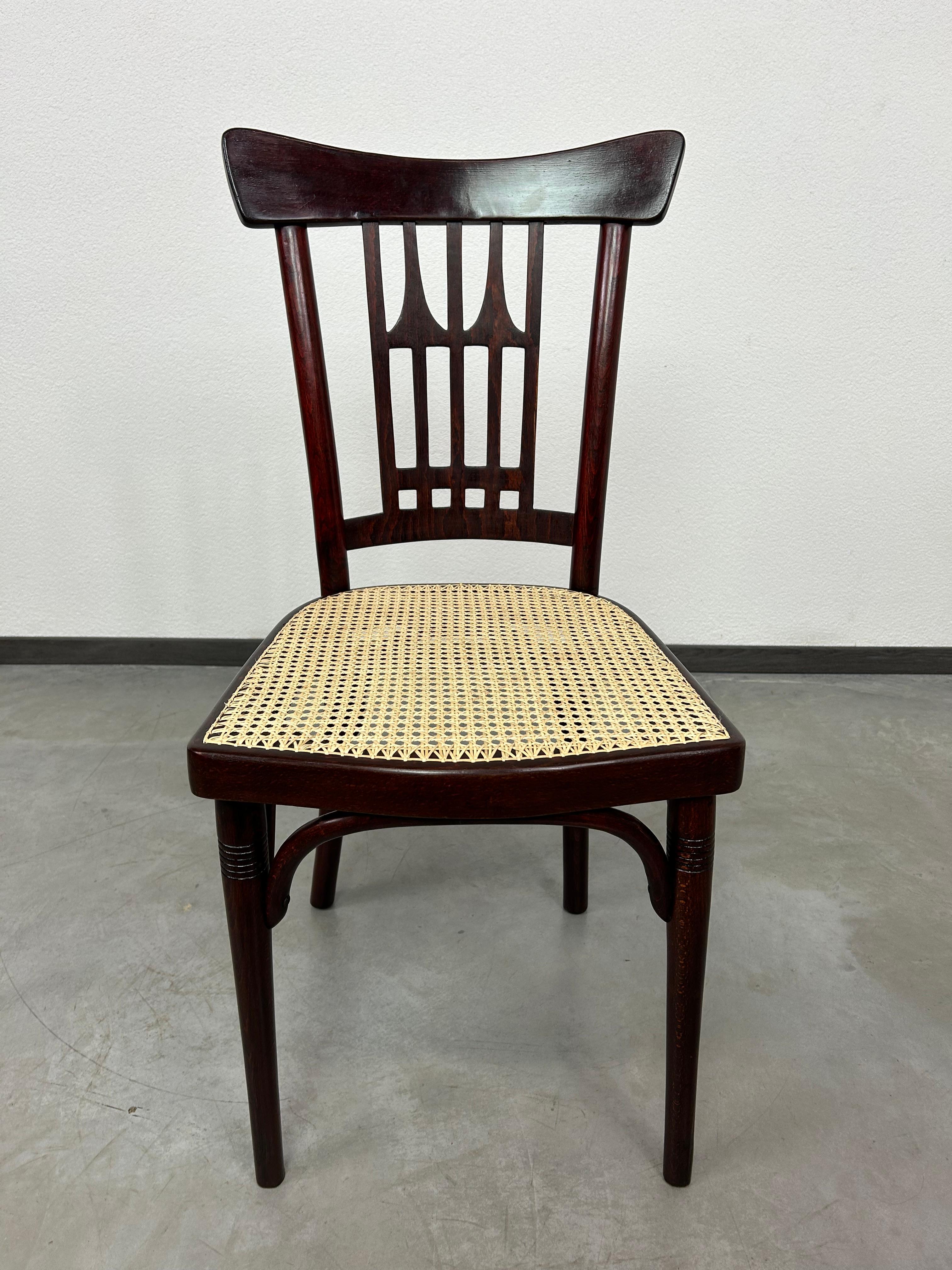 Vienna secession dining chair no.235 by Otto Wagner for J&J Kohn. Professionally stained and repolished with new handmade rattan seat.