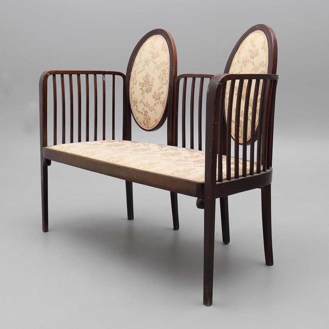 Extremely rare, beech bentwood frame with an upholstered seat and backrest. First time mentioned in the J. & J. Kohn catalog 1906 with the catalog no. 415. 
Designed by Gustav Siegel for J. & J. Kohn about 1906, catalog no. 415/2. Still in original