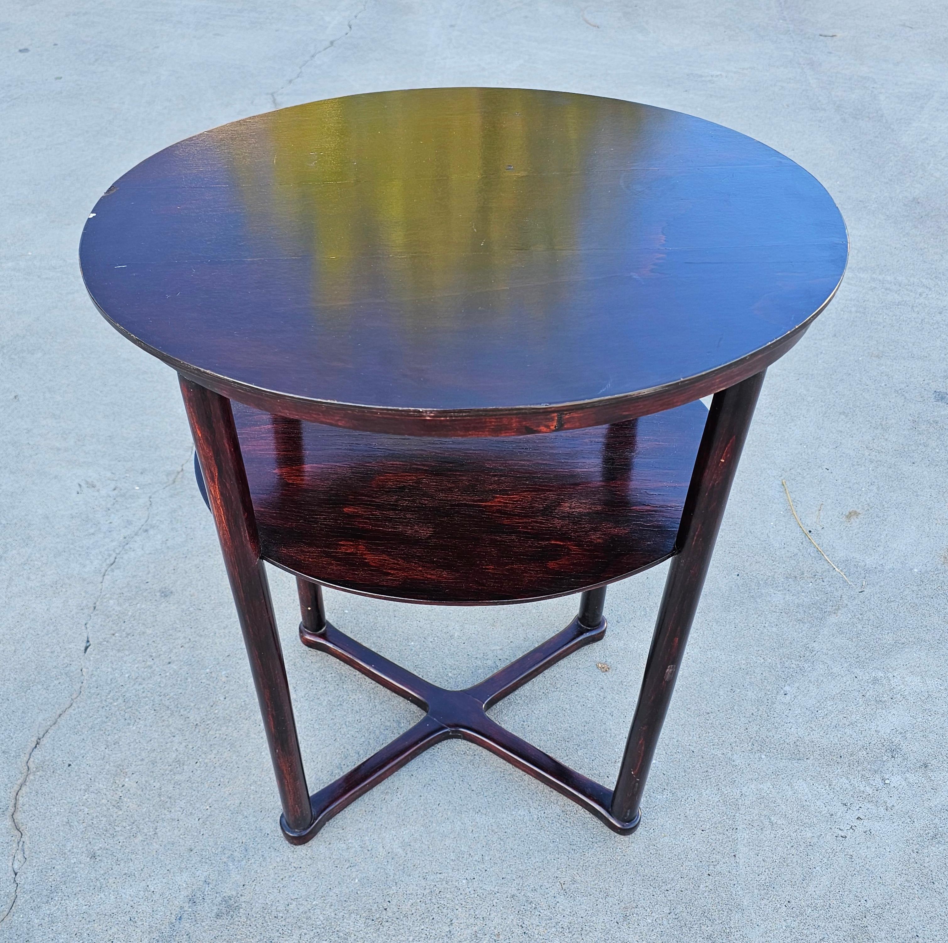 In this listing you will find a very rare Viennese Secession Oval side table Model 960/2 designed by Josef Hoffmann and manufactured by J&J Kohn. Made in Austria in 1910s. The scanned page of the Kohn's catalogue showing this model of the table is
