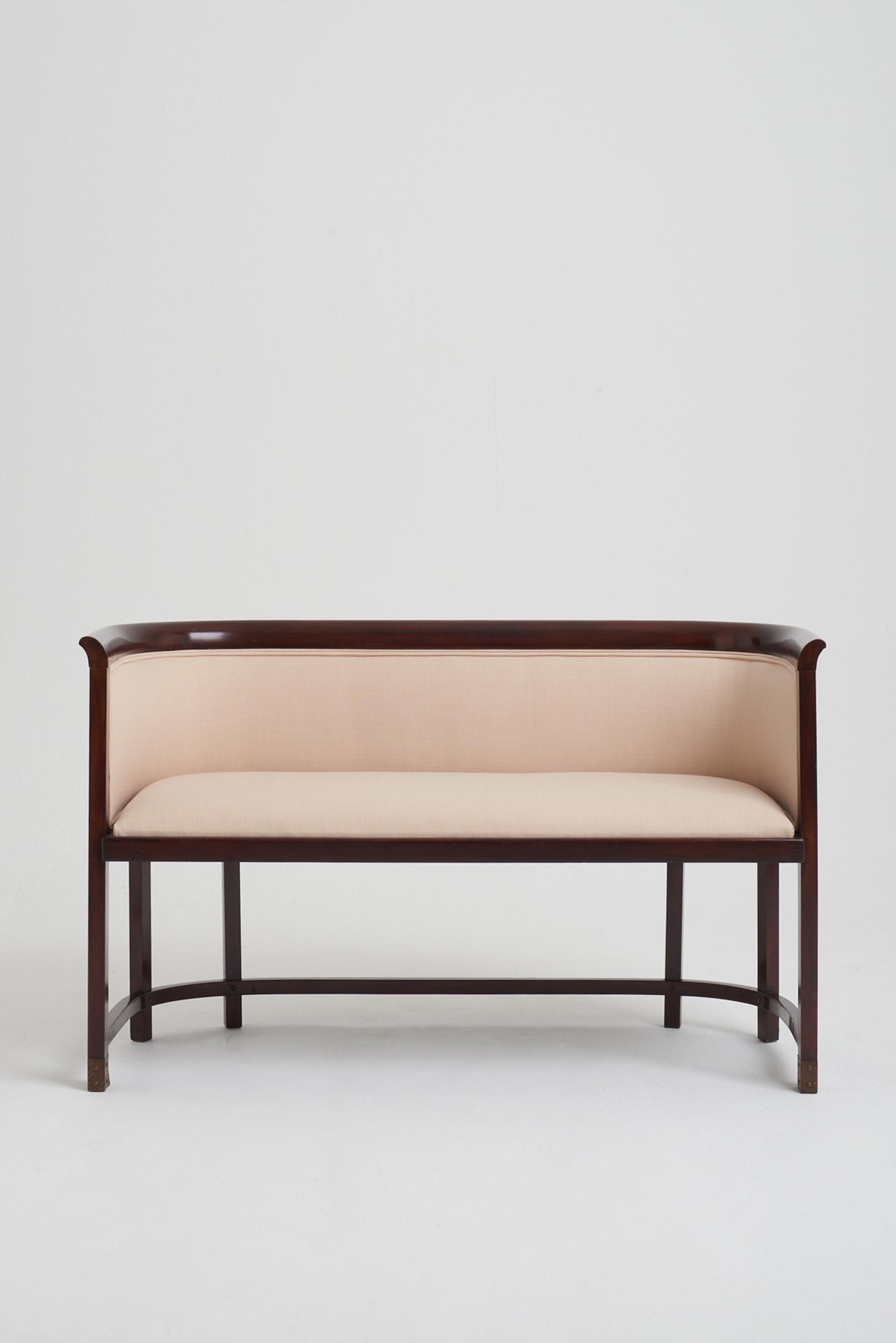 A Vienna Secession settee, most probably by Joseph Hoffman (1870-1956) for J. & J. Kohn.
Beech frame with hammered copper feet, newly upholstered. 
Austria, Circa 1900.