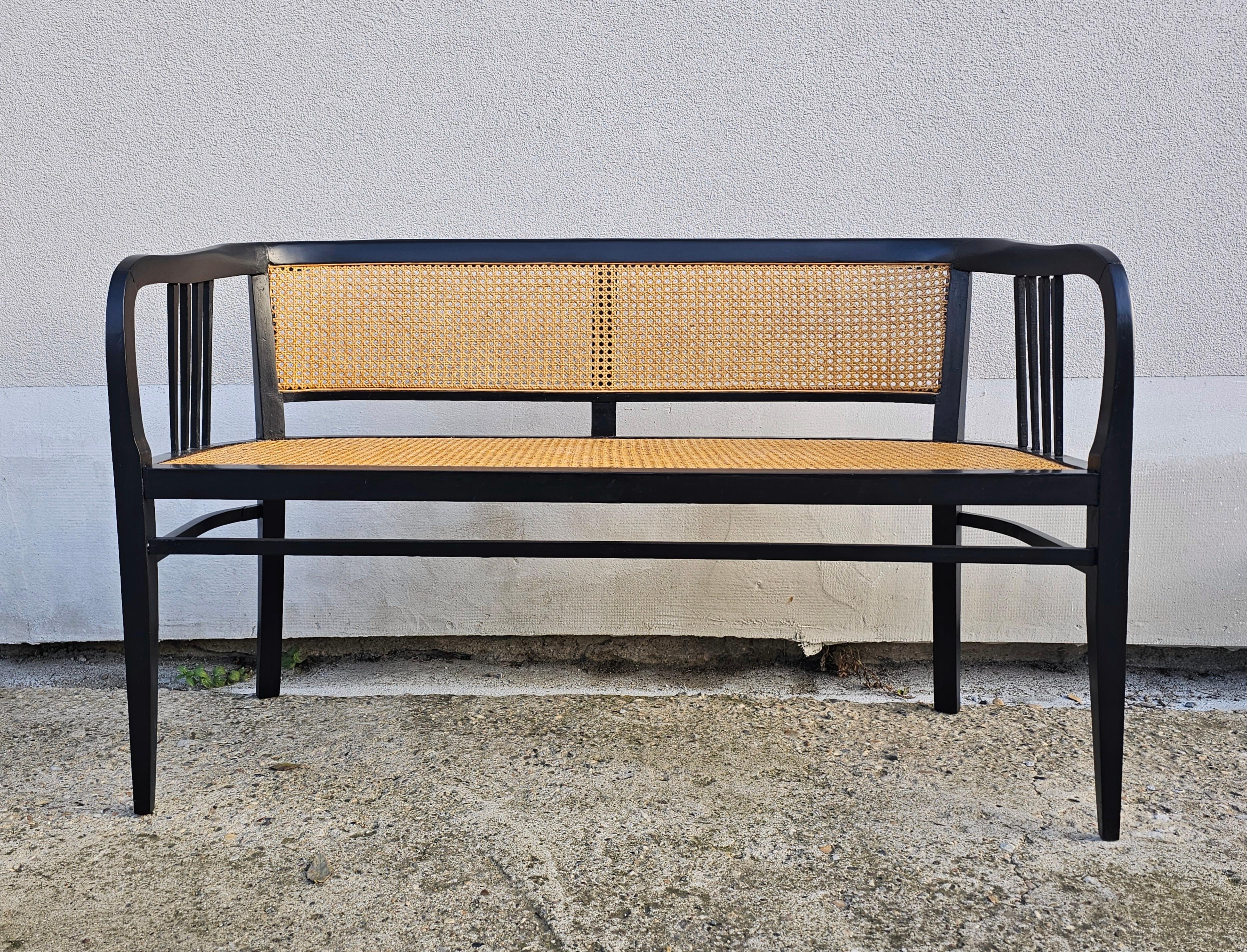 In this listing you will an antique Vienna Secession settee. It features simple, yet very effective design done in bench wood, with all the attributions of Vienna Secession. The seat and the backrests are done in cane. Made in Austria cca.