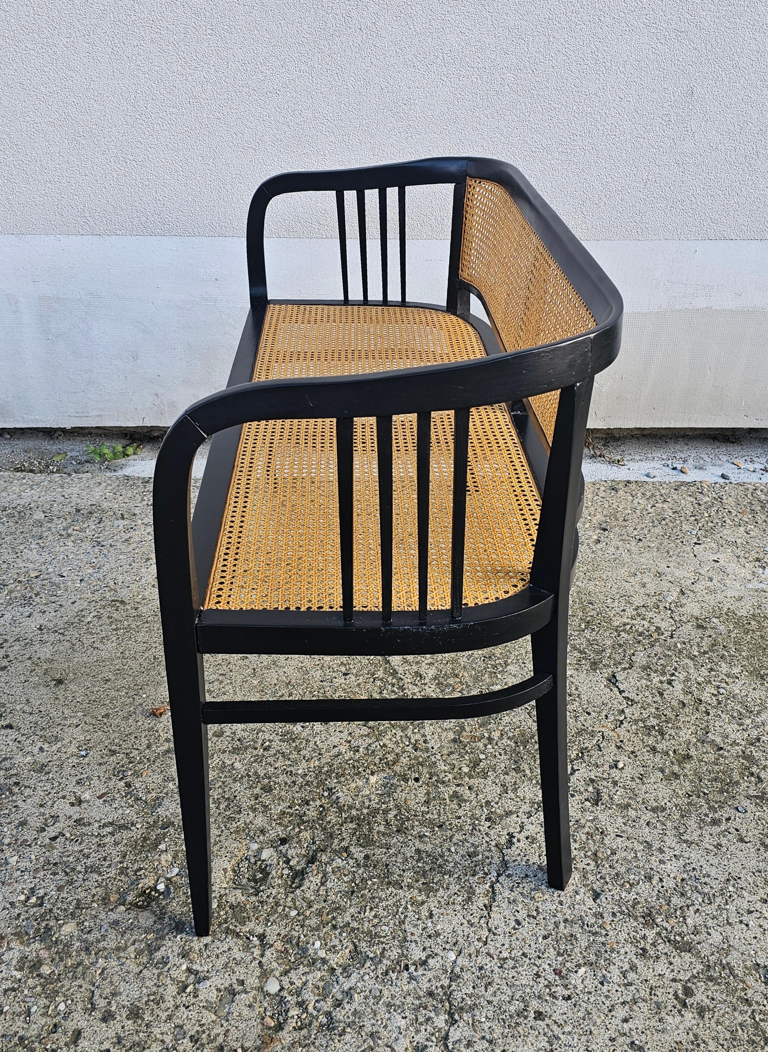 Cane Vienna Secession Settee done in beech with the cane seat and backrest For Sale