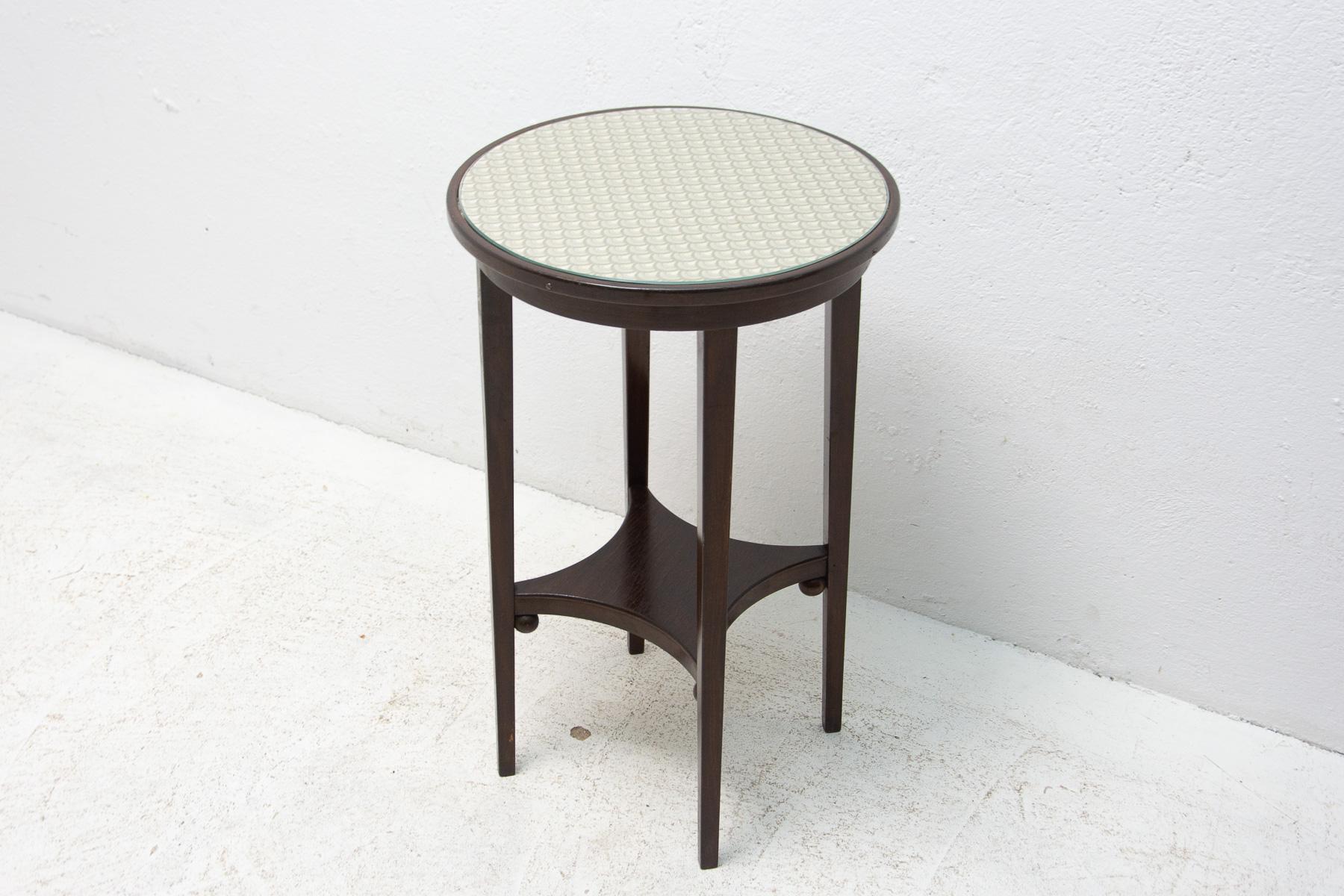 Side table designed by Josef Hoffmann, circa 1915. The table is made of beech stained wood, a new fabric in the Vienna Secession style is placed under the glass. The table is in very good condition, fully renovated.

Measures: height 71