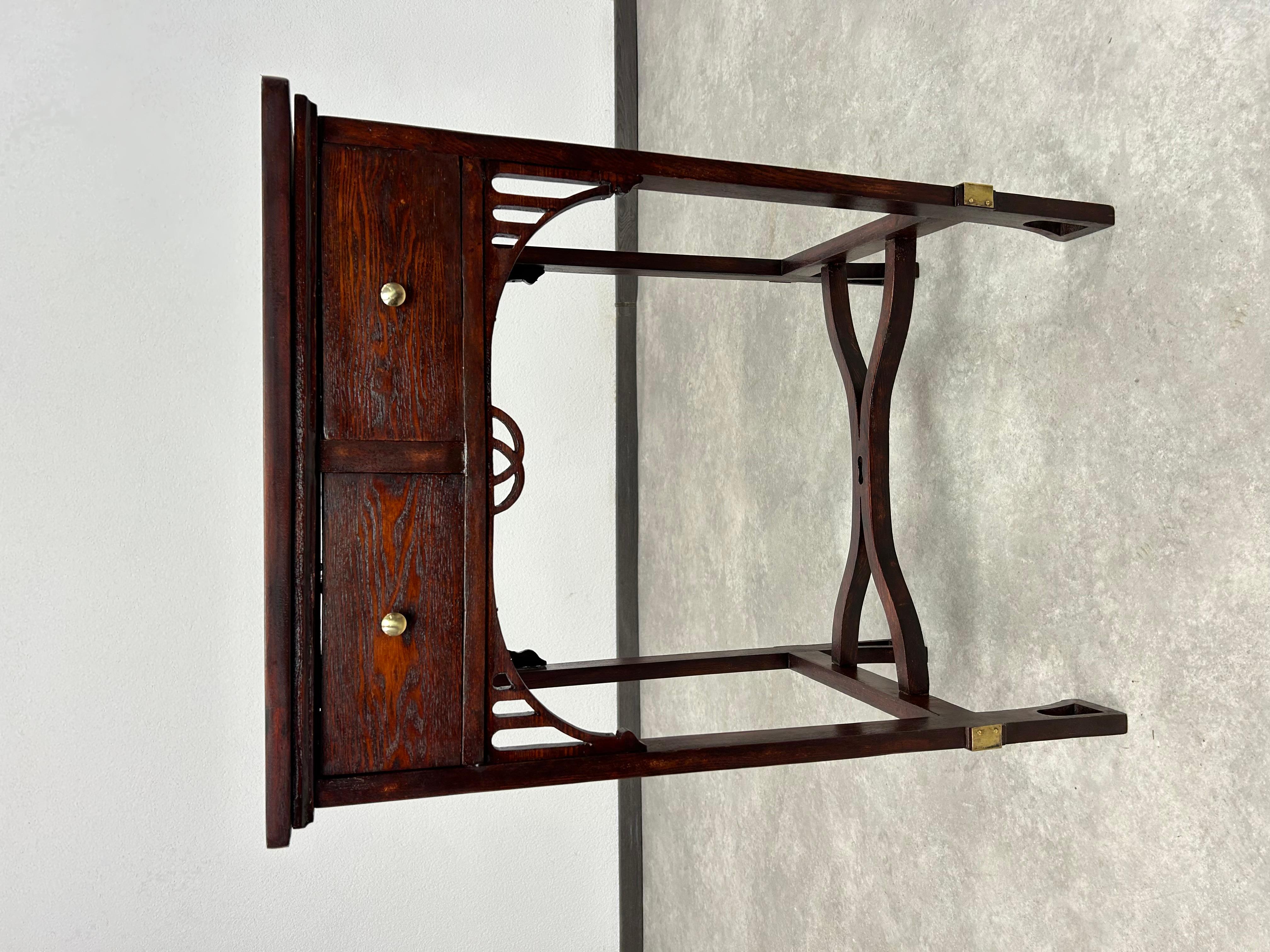 Vienna secession side table wrth mahogany table top and brass fittings. Professionally stained and repolished.