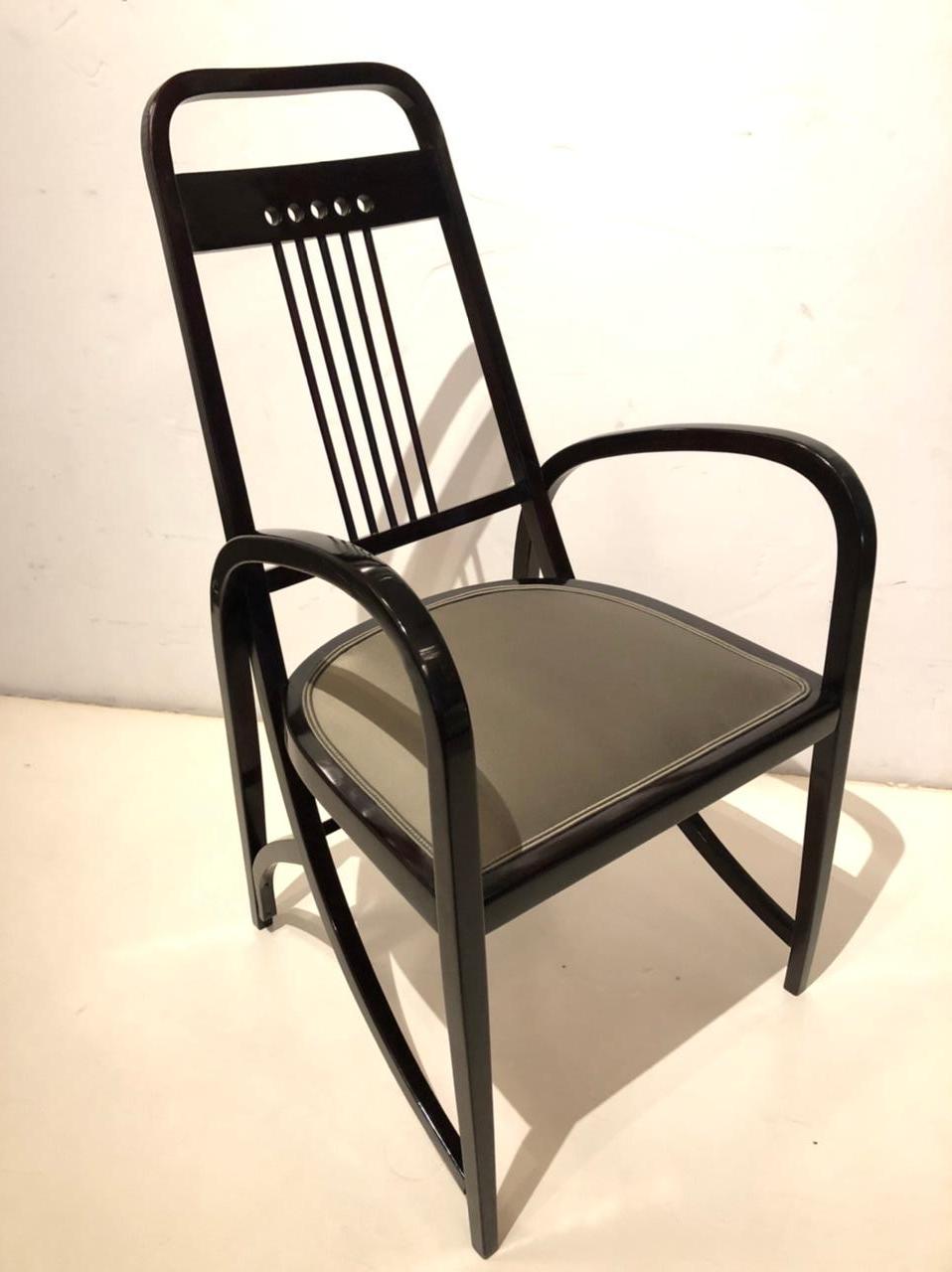 A Vienna secession Thonet bentwood armchair #511.
Stained beechwood with an upholstered seat.