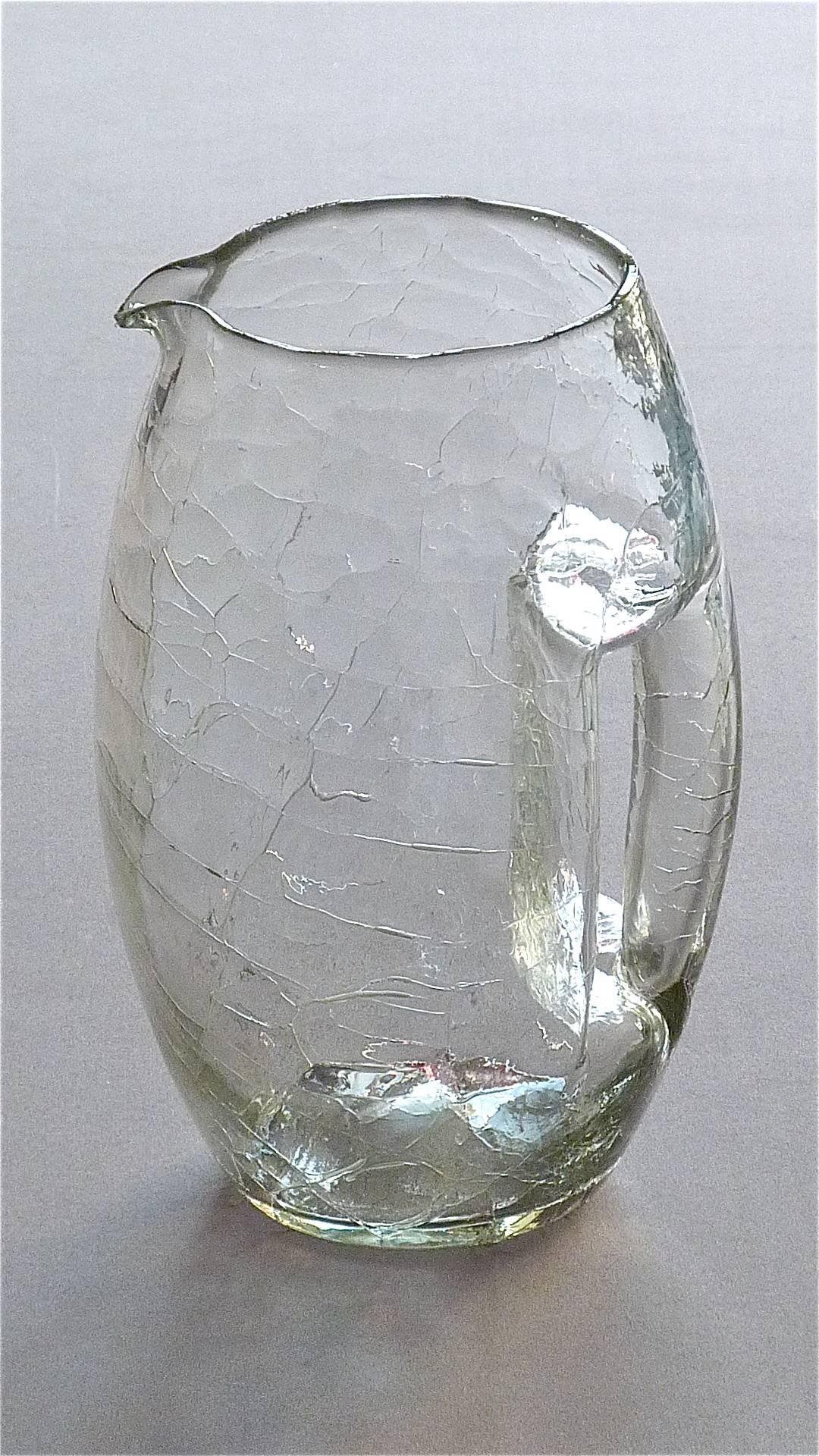 Rare big and fine secessionist Art Nouveau / Jugendstil crackle crystal glass jug, vase or pitcher designed by Koloman Moser (1868-1918 ) Vienna, Austria around 1900 and executed by Johann Loetz Witwe Bohemia / Czech Republic. The pitcher made in a