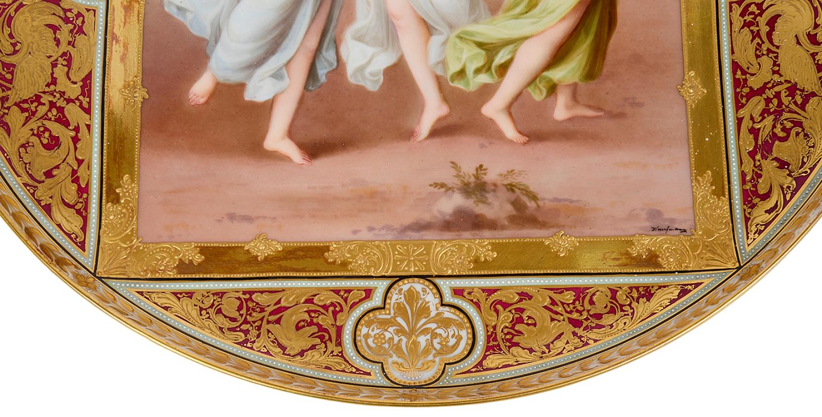 A very good quality late 19th Century Vienna porcelain style charger, having wonderful classical scrolling gilded decoration to the boarders, with a scene depicting the 'Three Graces' .
 