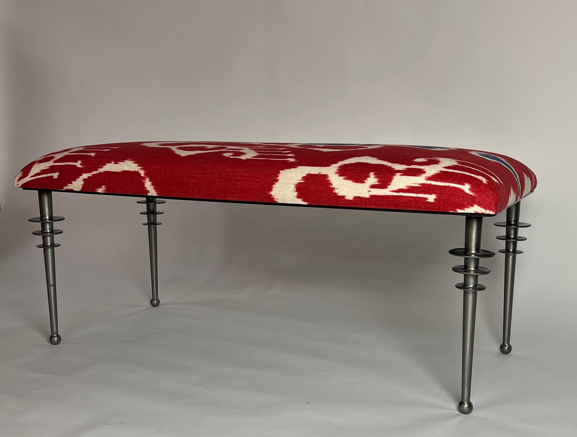 Vienne bench upholstered with a batik fabric. Cast iron legs.

Custom size available. Can be created COM.