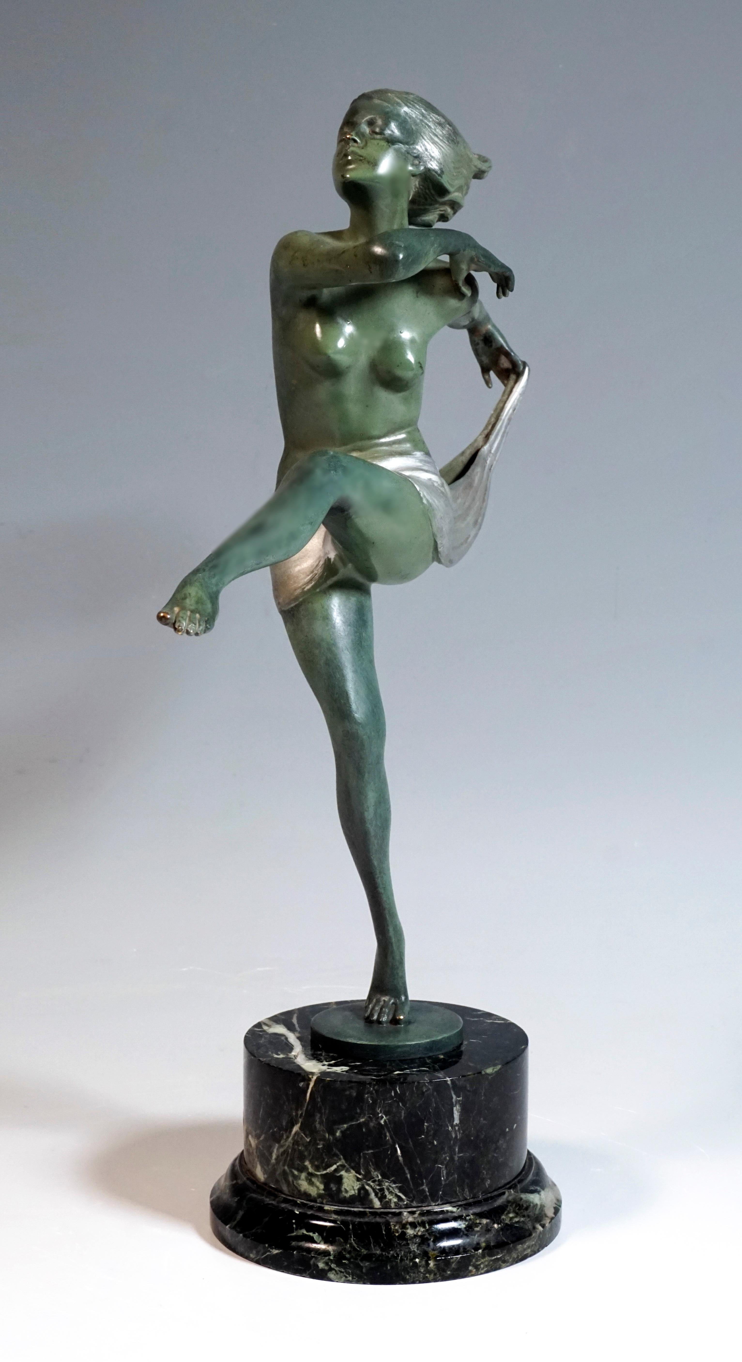 Excellent piece of Viennese Bronze Art

The graceful, bare dancer with short, full hair rises on her right toes, elegantly stretching her left leg forward, right arm horizontally, bending her hand next to her left shoulder, stretching her left arm