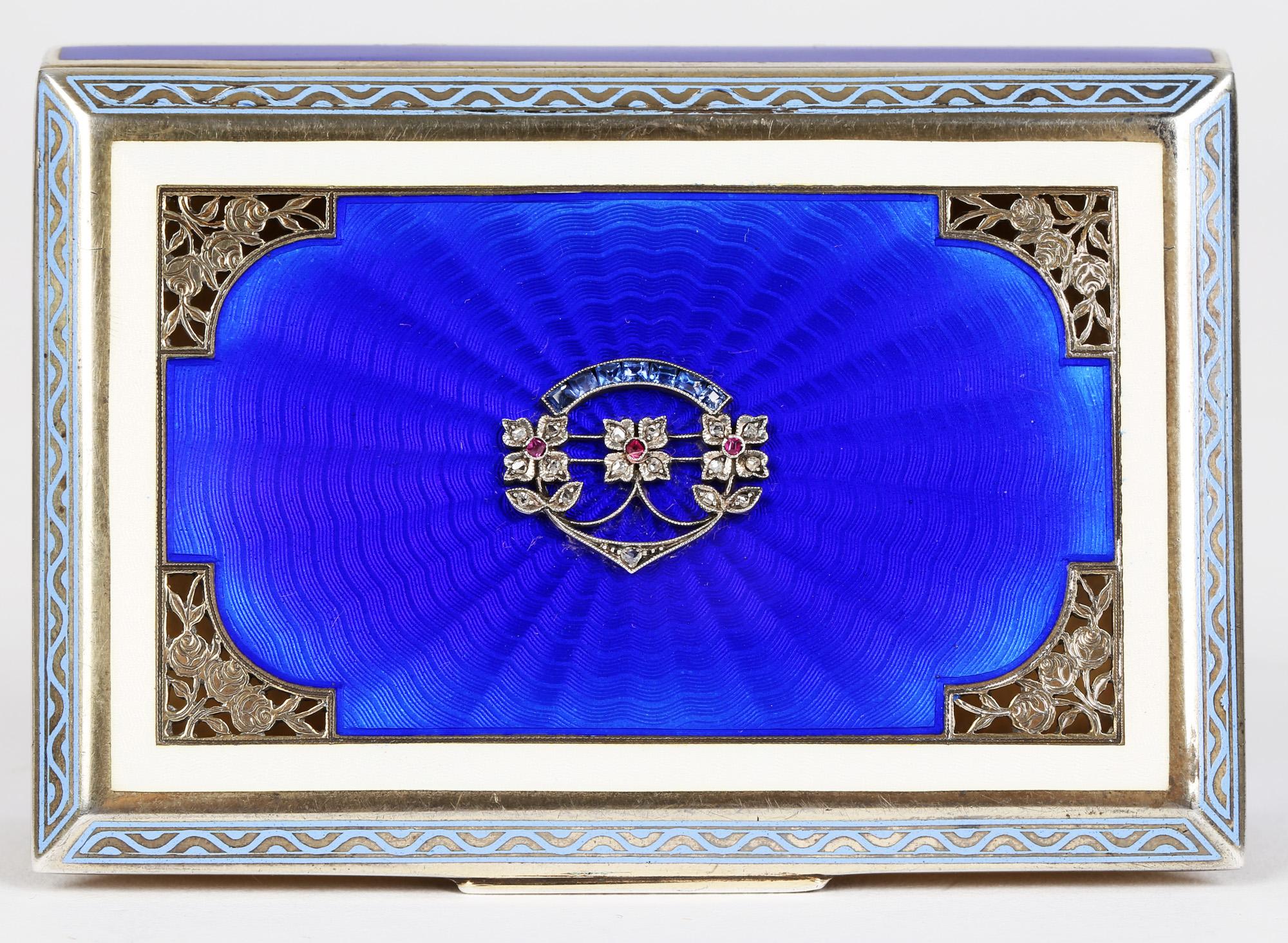 An exceptional quality and heavy gauge Austrian silver gilt guilloche enamel box set with gem stones probably originating from Vienna and made between 1872 and 1922. The box of flat rectangular shaped has inset rich blue enamel panels around the