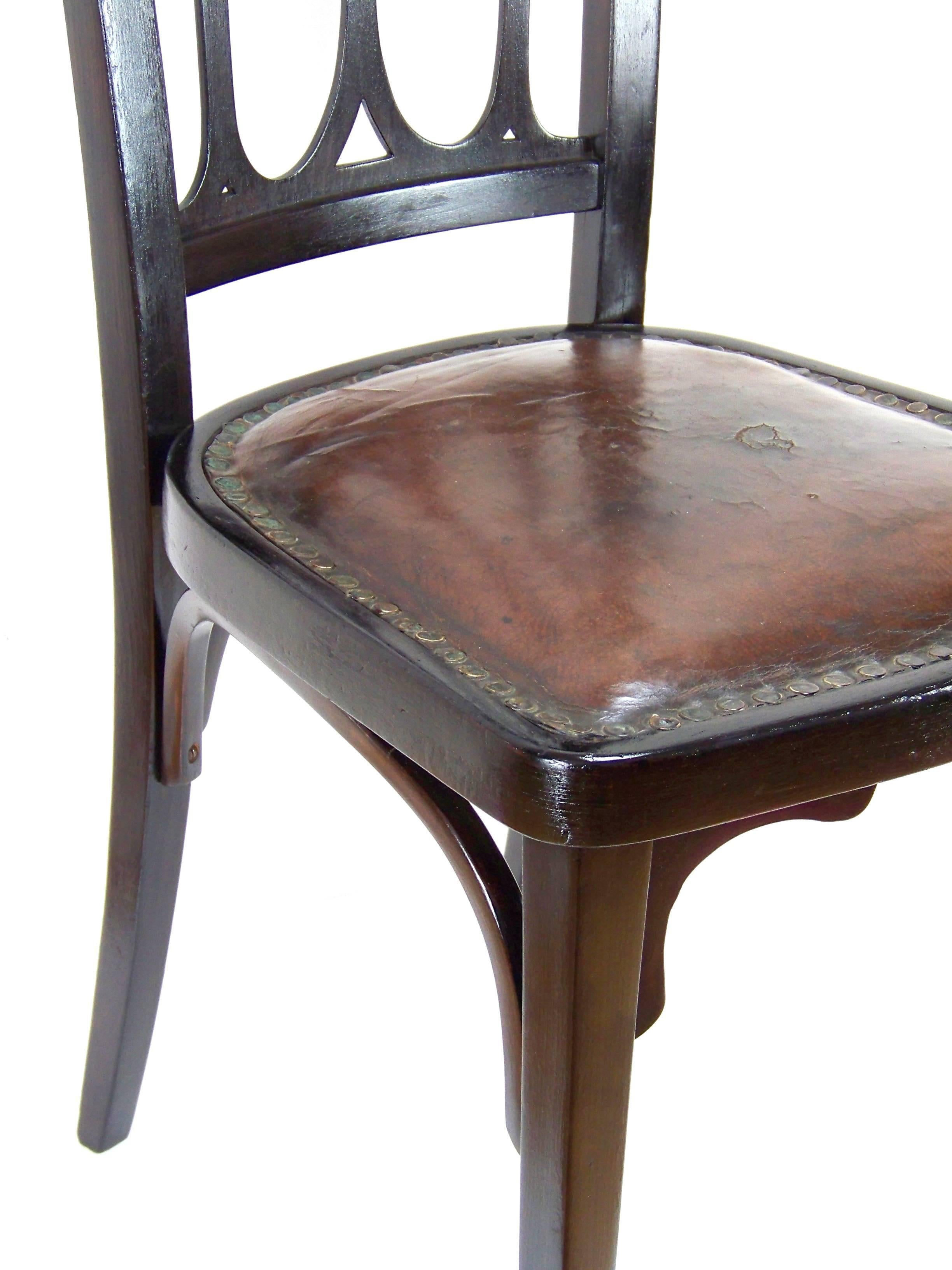Manufactured in Austria by the Jacob & Josef Kohn company. In the production program was included circa 1906. Marked with stamp and paper label under the seat. Original polish was cleaned and re-polished with shellac finish. Color: Dark brown.