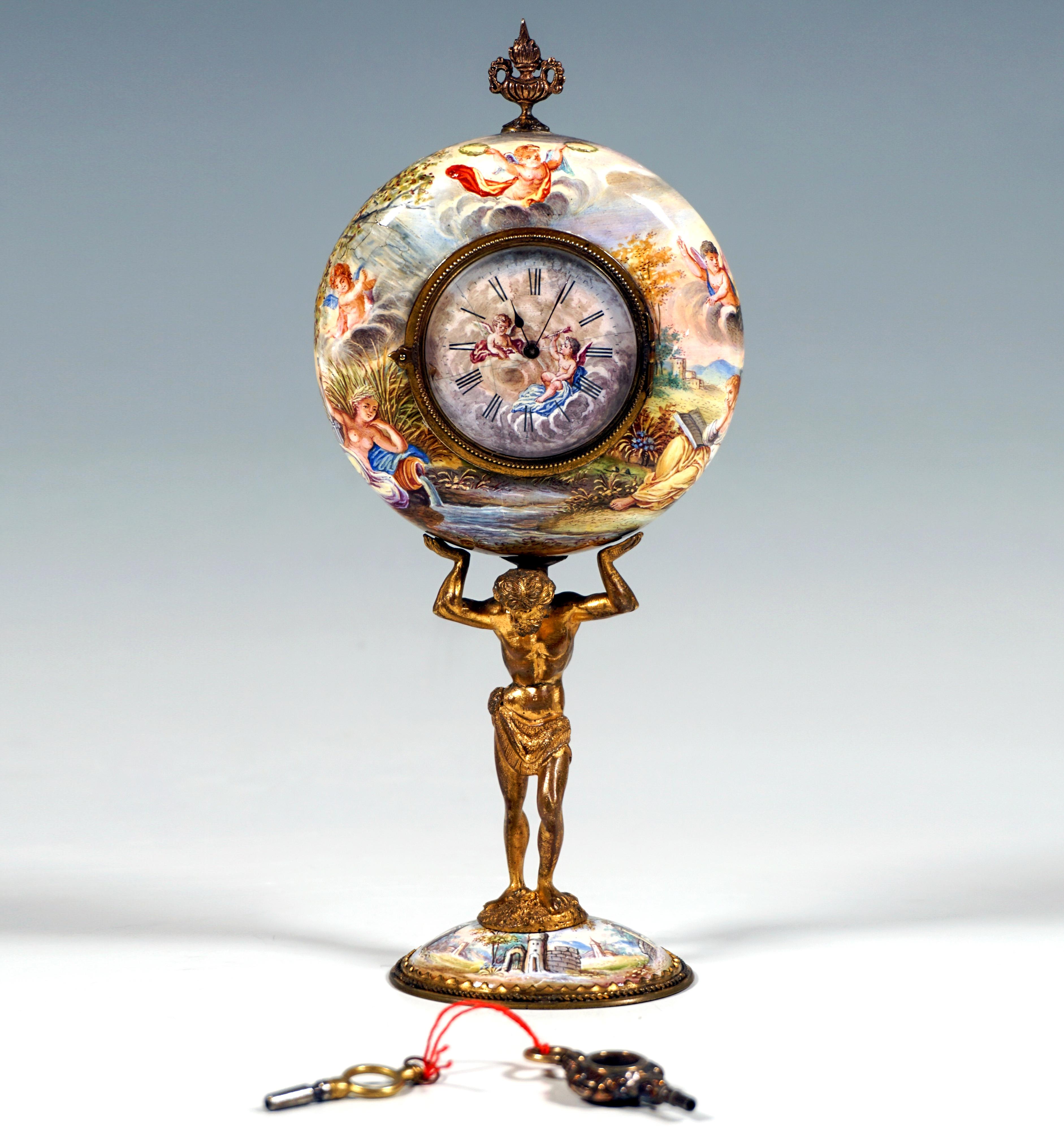 Artfully decorated fire-gilded and enamelled bronze clock by a Viennese master:
Fully sculpted bronze Atlas on a slightly curved oval base supporting a round clock case, all surfaces covered with fine enamel painting - on the base, which is framed