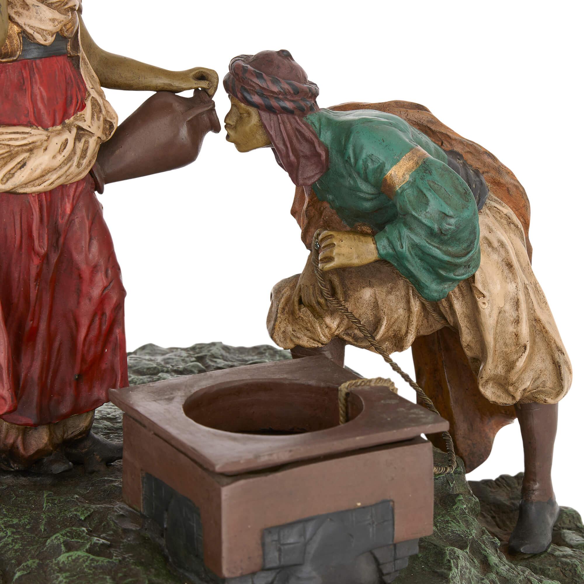 Viennese cold-painted bronze by Bergman depicting Rebecca at the well
Austria, c. 1910
Height 30cm, width 30cm, depth 30cm

This figural bronze replicates the biblical story of Rebecca at the well (Genesis 24:11-22), where Rebecca’s selfless act of