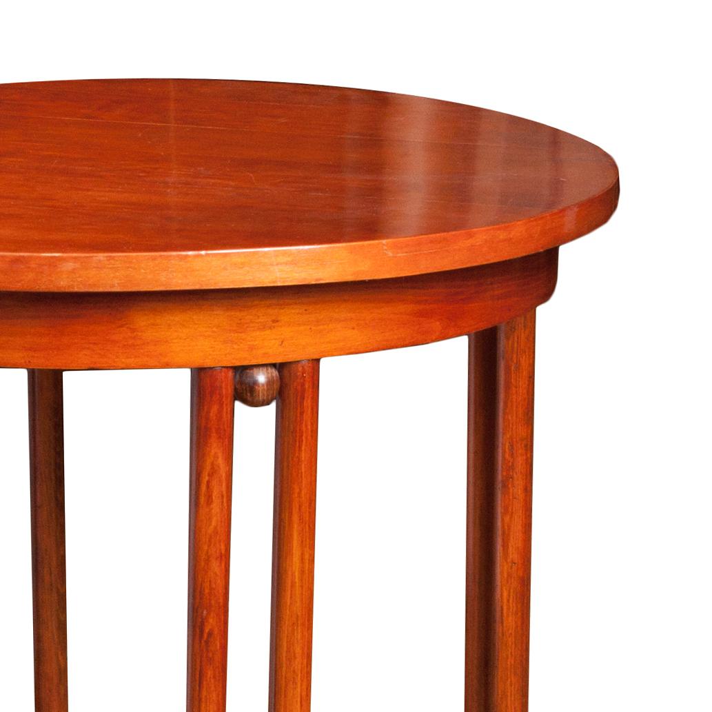 This table is made entirely of bent orange beechwood, varnished and polished. It is a fusion of two styles: Josef Hoffmann’s Secession and Thonet’s furniture aesthetics. The table has the original signature sticker under the top. Icon of European