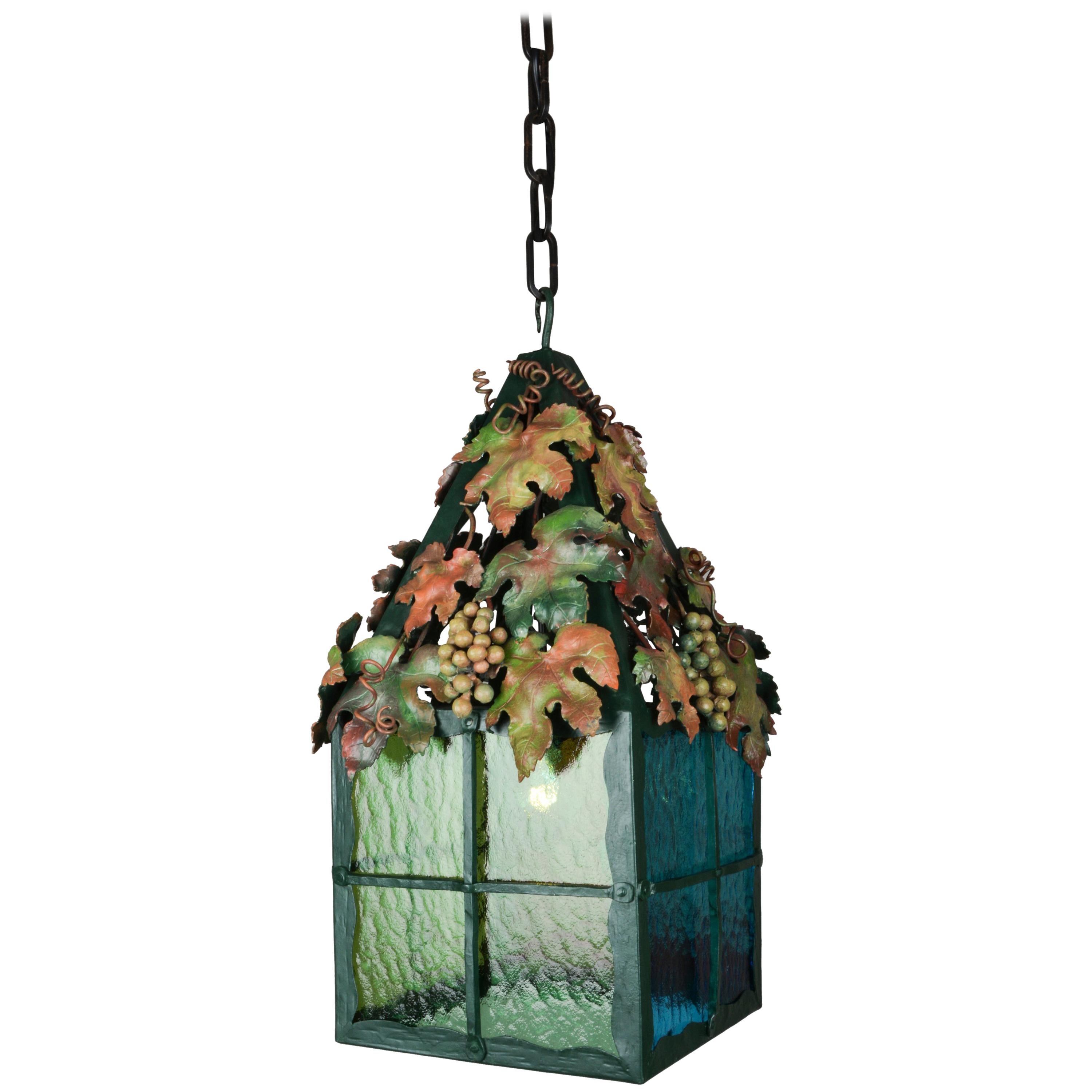 Viennese “Heurigen” Lantern of Wrought Iron with Tinted Glass Wine Leaf Decor For Sale