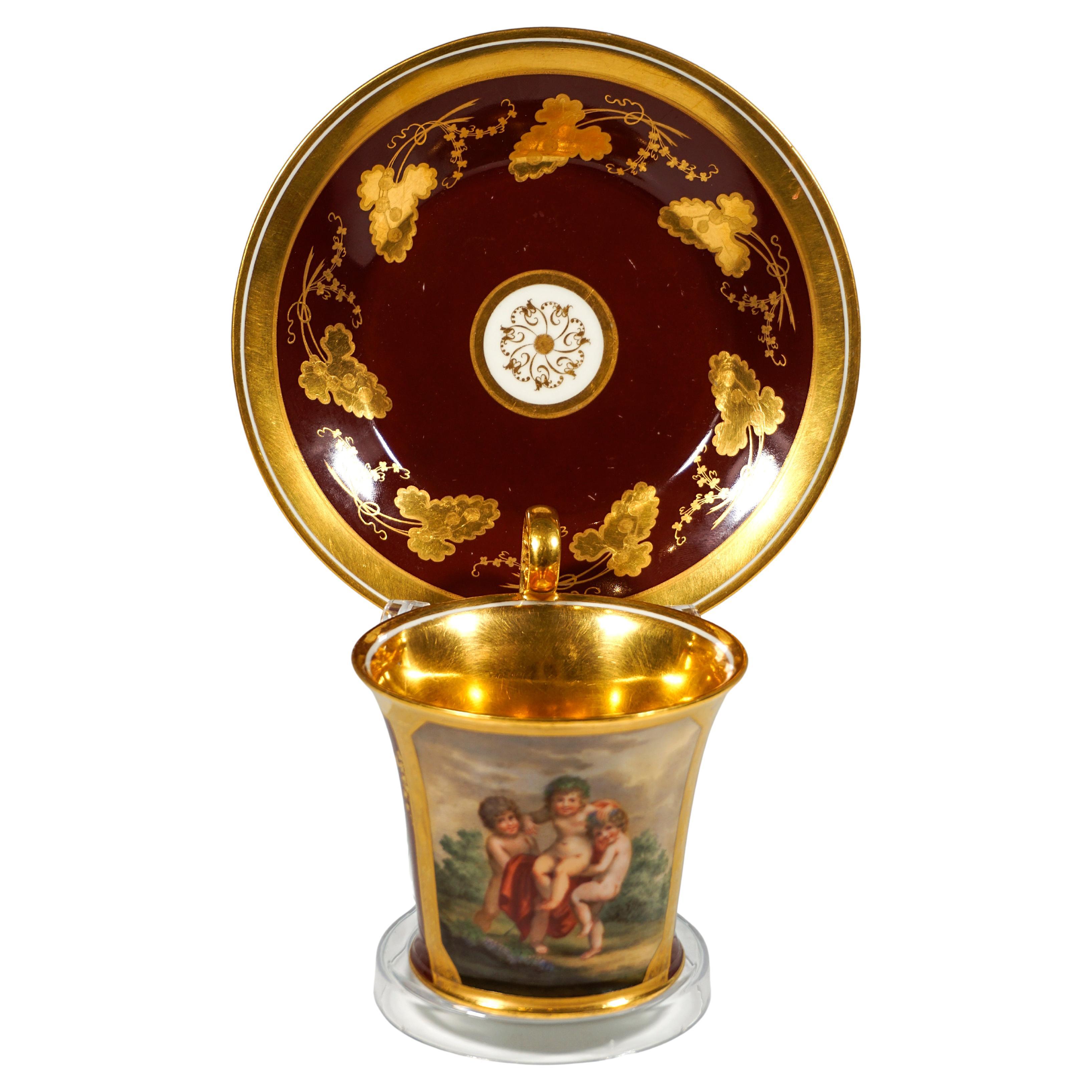 Viennese Imperial Porcelain Collecting Cup 'Three Cupids As Bacchants', 1816