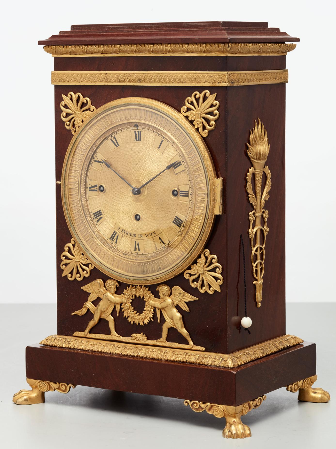 Mahogany Viennese mahogany and gilt mantel clock by J Straub  For Sale