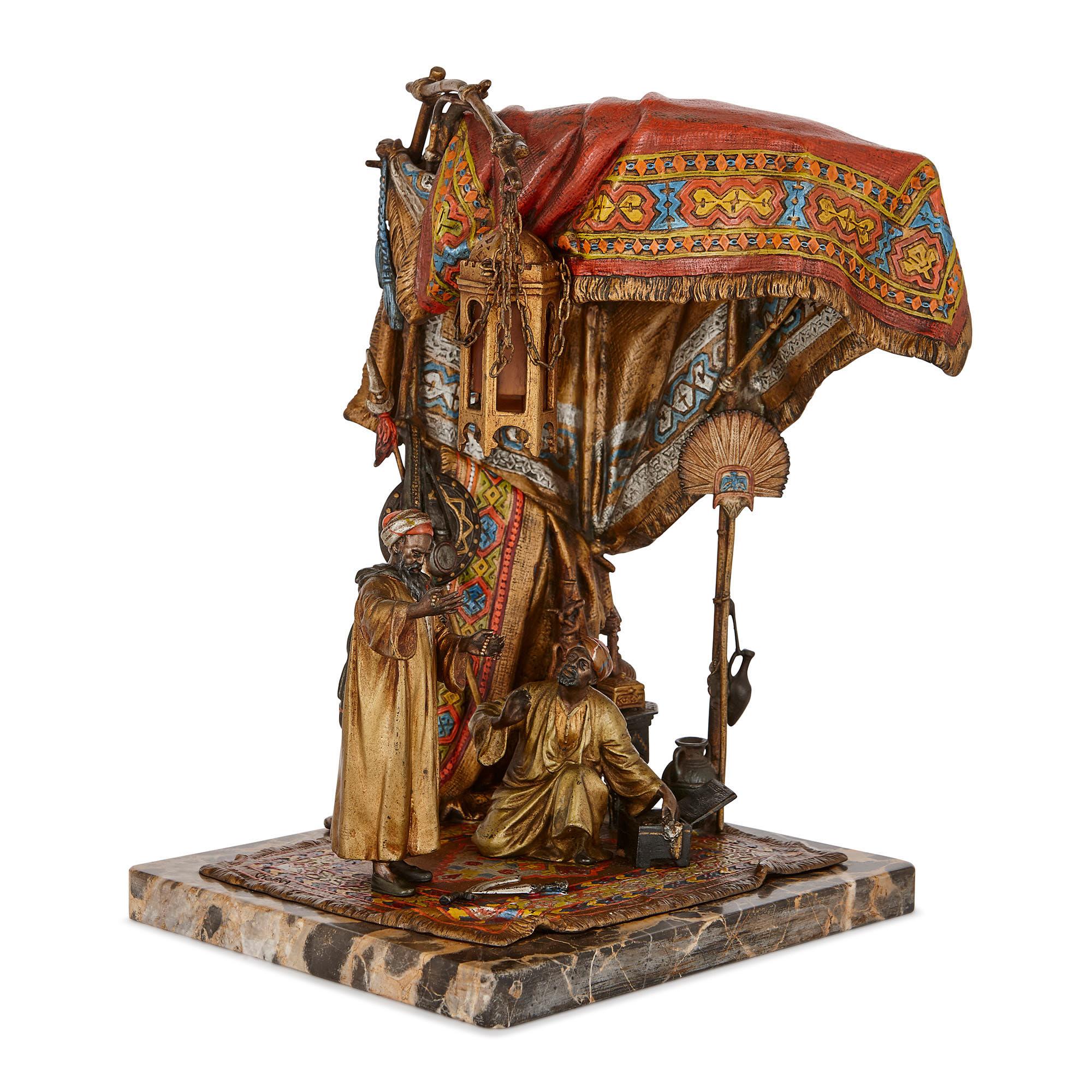 This Orientalist style, cold-painted bronze lamp was crafted in Vienna in the early 20th century. Vienna was well-known across Europe for its production of bronzes in the 19th and early 20th century. These were often cold-painted, meaning that the