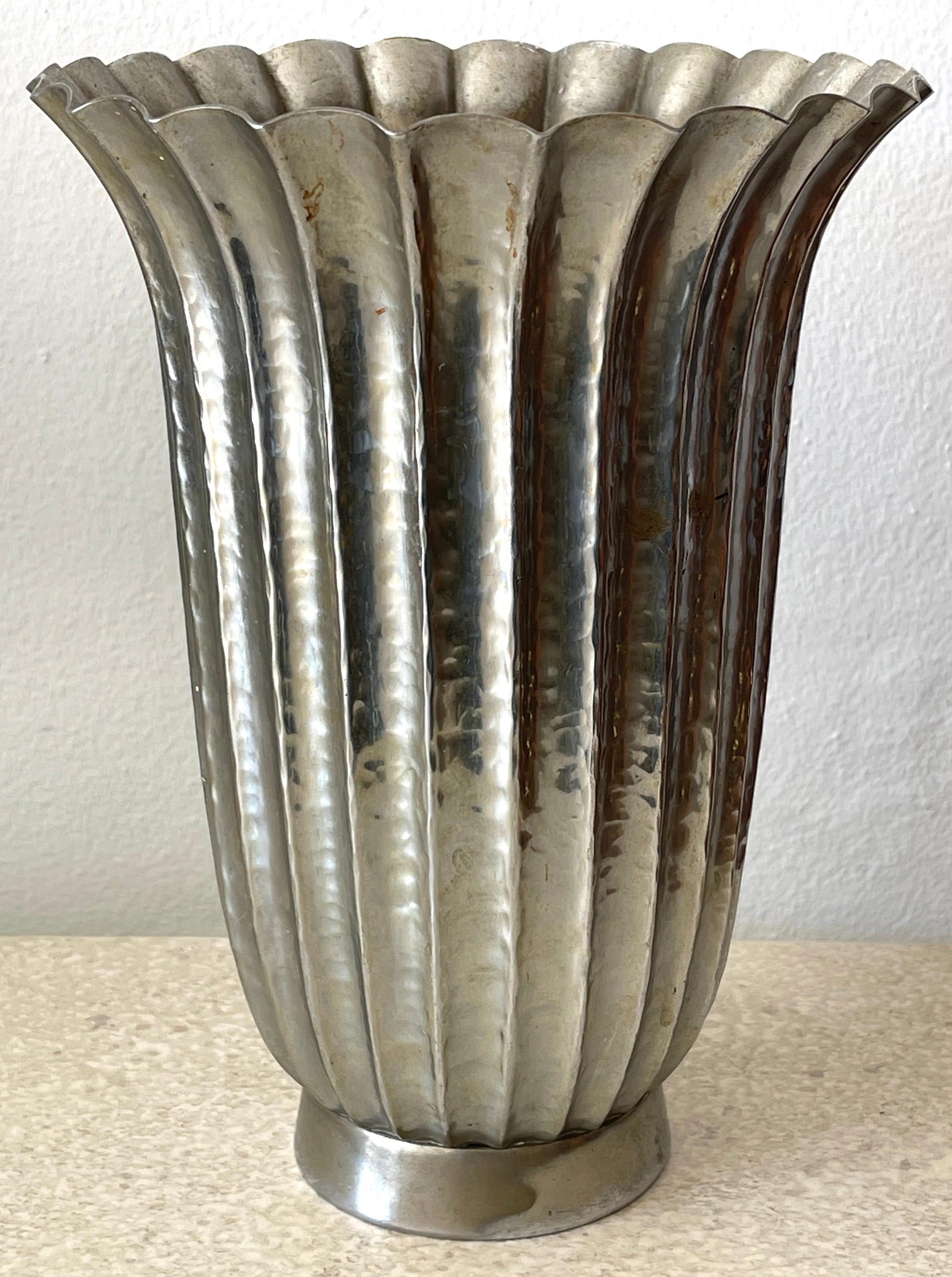 Viennese Secessionist style fluted vase, of typical form with influences of Josef Hoffmann/ Wiener Werkstatte. Nickel over copper, beautiful patina. 
Hallmarked with Standing Bear/ Trademark / Stamped copper. 
The vase stands 10-inches high x 7.5