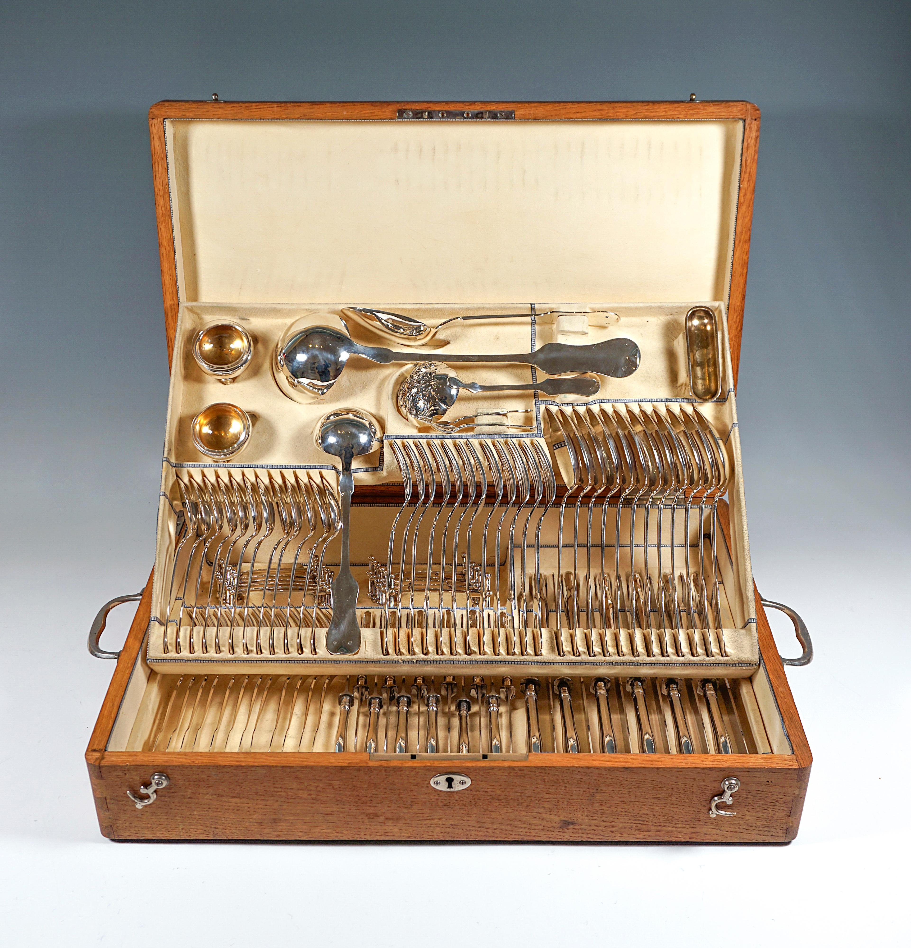 Elegant cutlery Set Made Of Solid Silver For Twelve People Consisting Of 93 Parts in original wooden box.
 
Date of manufactory:  circa 1890

Material:   Massive silver '800'

Form type:  Decent smooth, simple design called 'Violin case', without