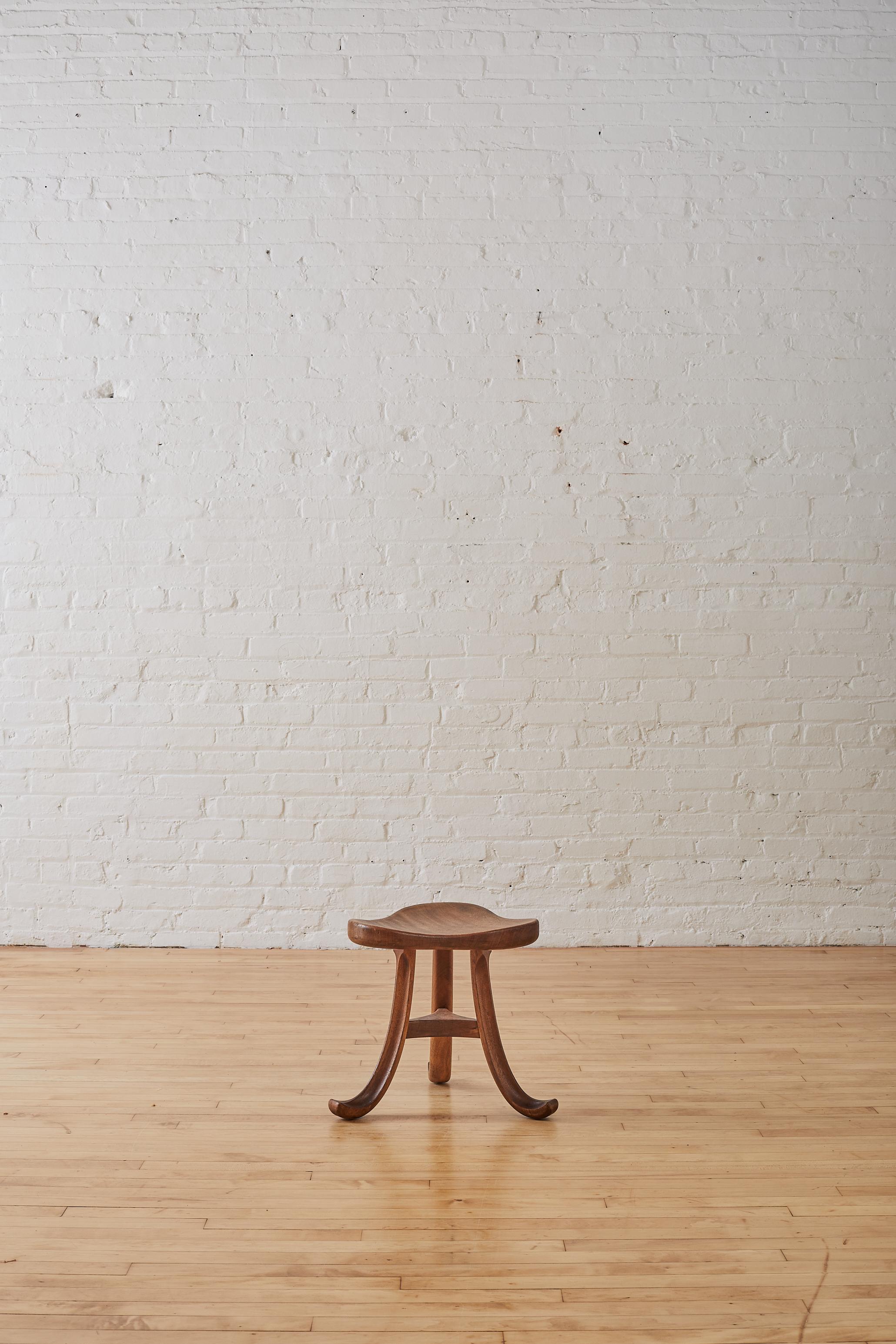 Viennese Walnut Stool with curved tripod legs.