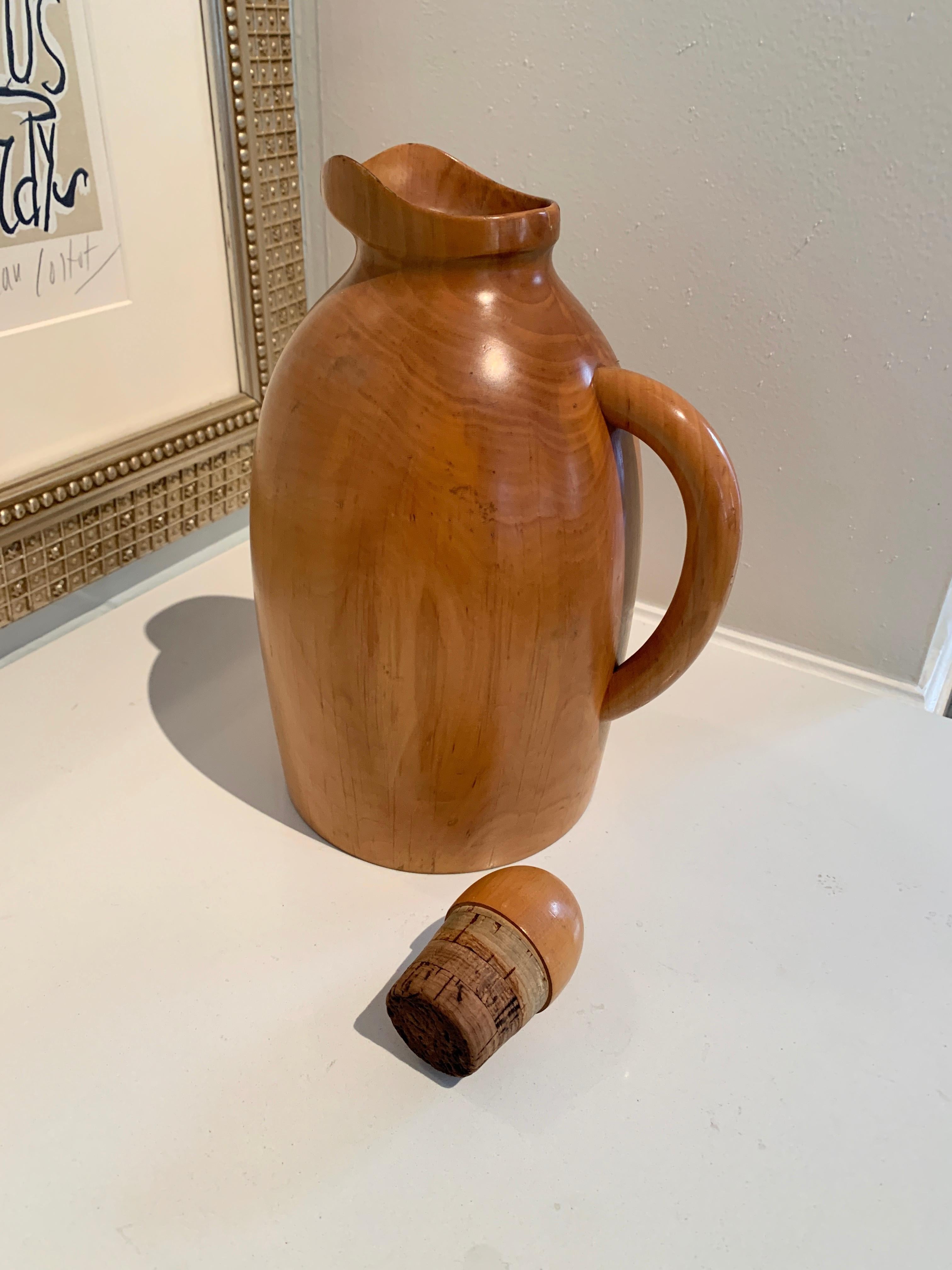 Exquisitely designed by Manzoni Pietro, the midcentury bar will be the conversation piece with your new all wood, and very chic Pitcher with glass thermos inside that can serve warm or cold, beautifully designed wood, frame with thermos and special