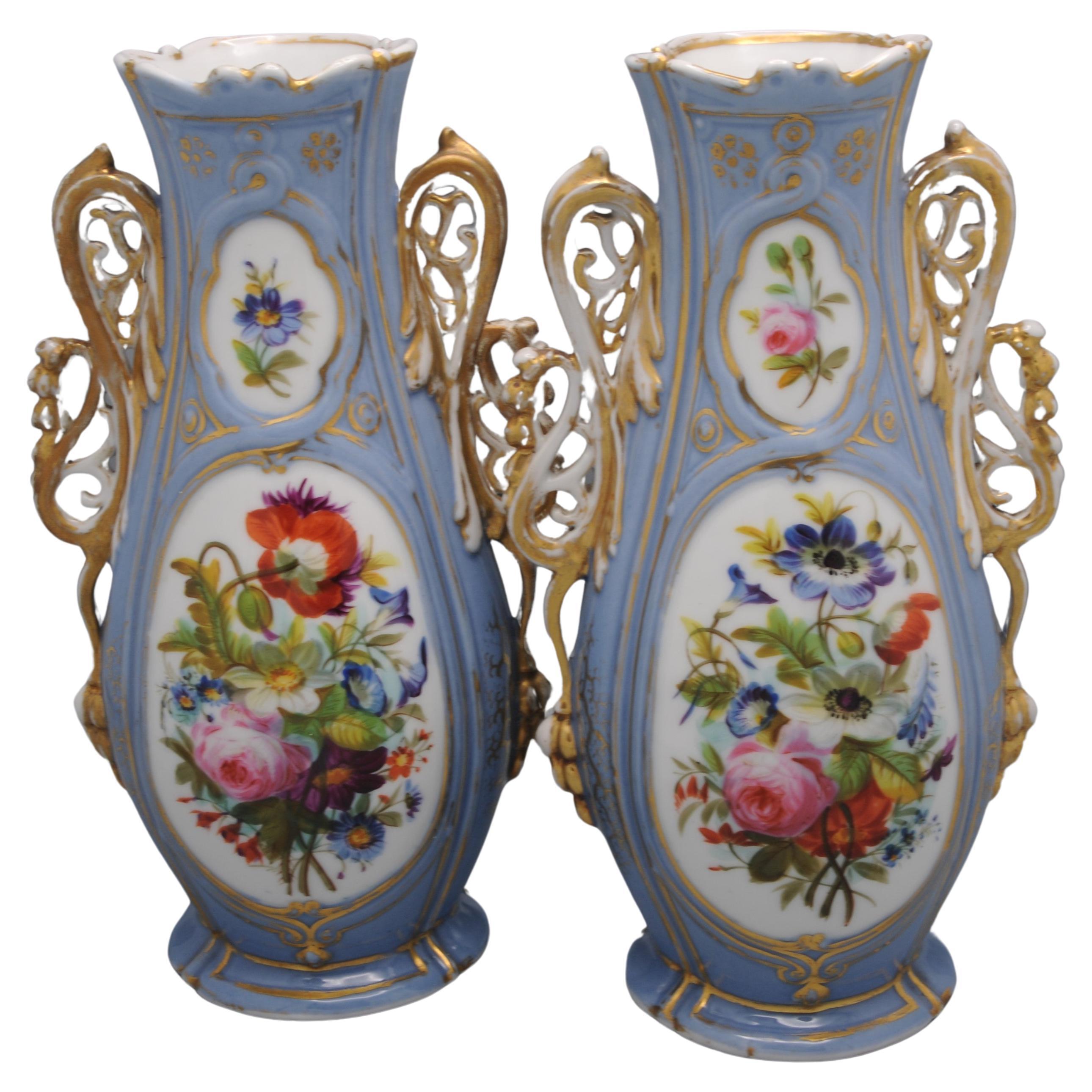 Very ornate pair of Vieux Paris or Vieux Bruxelles romantic vases, second half 19th century
Baluster form, heavy porcelain vases decorated with flowers and floral sprays on a lilac font. Outward scroll handles. The sides and back decorated with gilt
