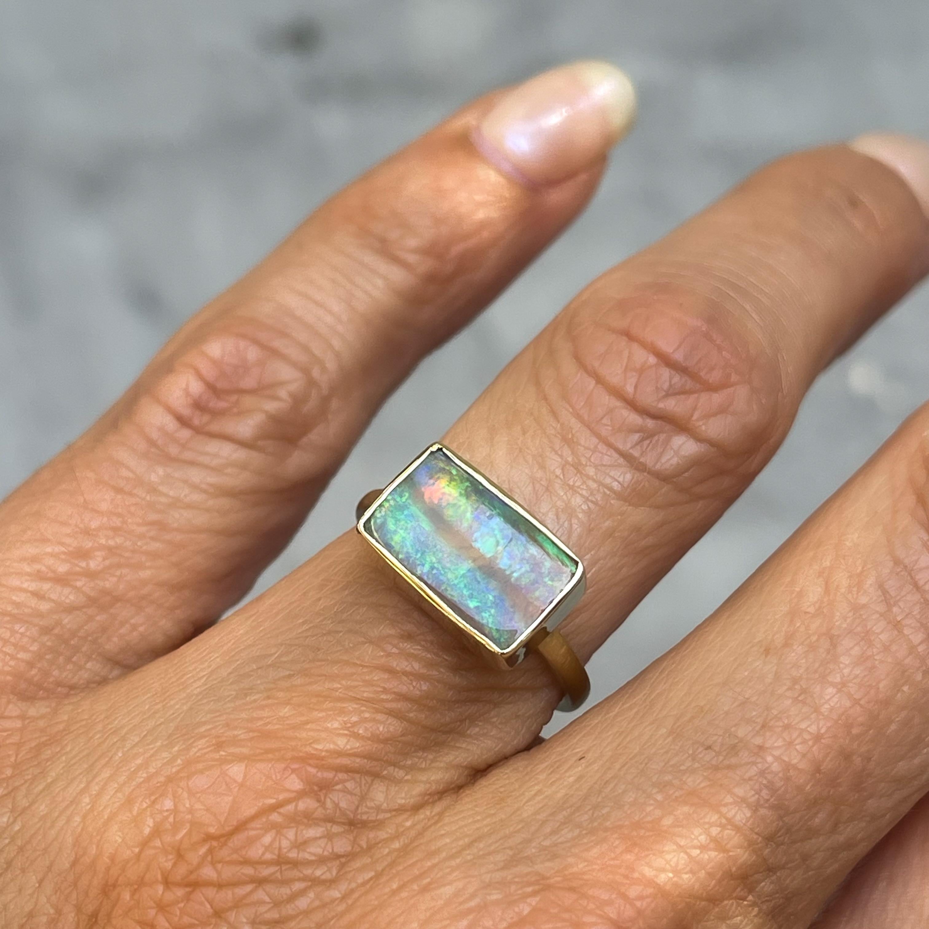 View from a Rainbow Australian Opal Ring in 14k Gold by NIXIN Jewelry For Sale 3