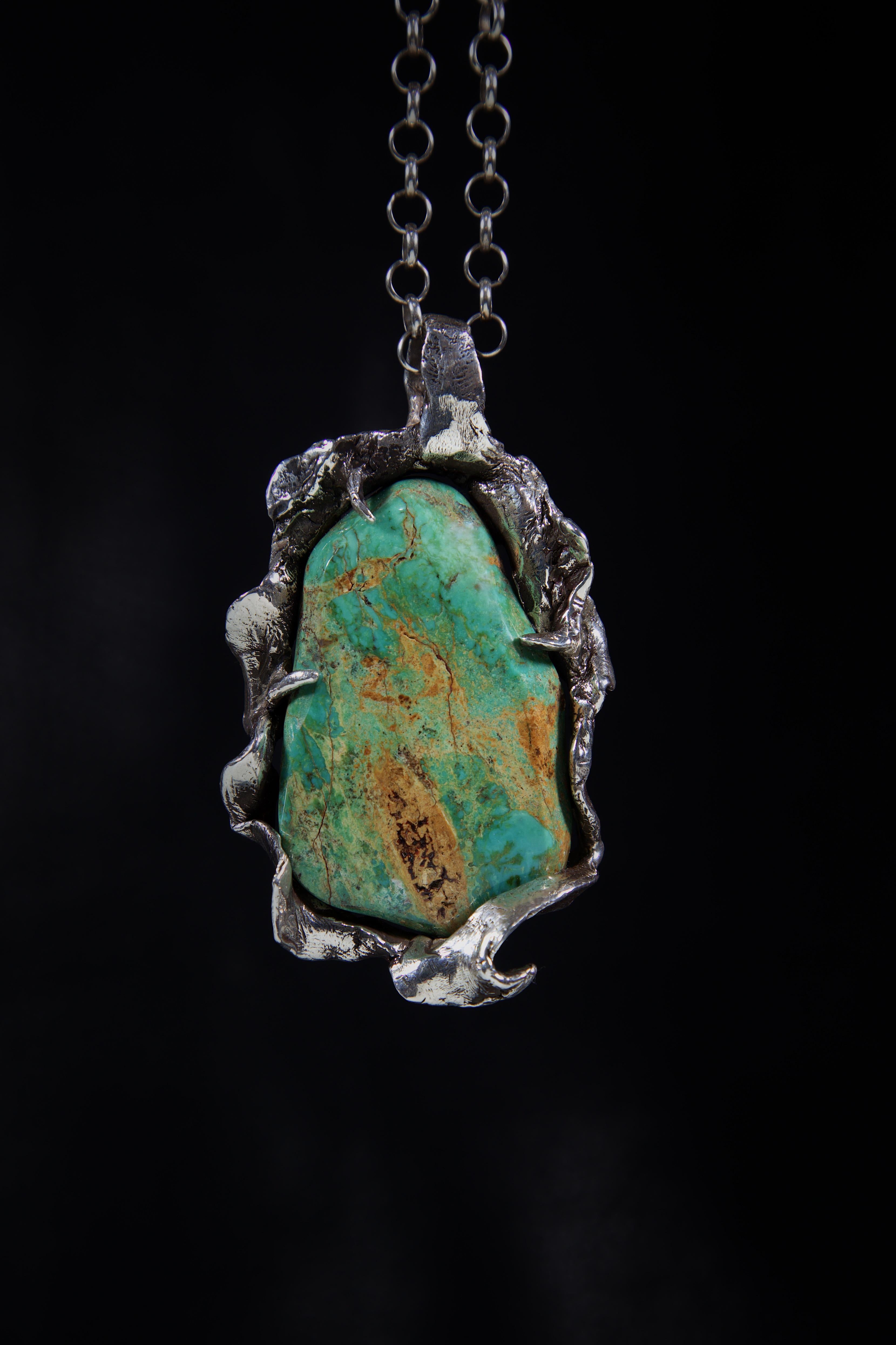 View from the Sky is a one-of-a-kind piece by Ken Fury that is hand-carved and cast in sterling silver.

Stones: King’s Manassa Turquoise 

Size of piece: 45mm x 82mm

The stone is large and is 53mm x 34mm

Hand-signed.

A 24-inch sterling silver
