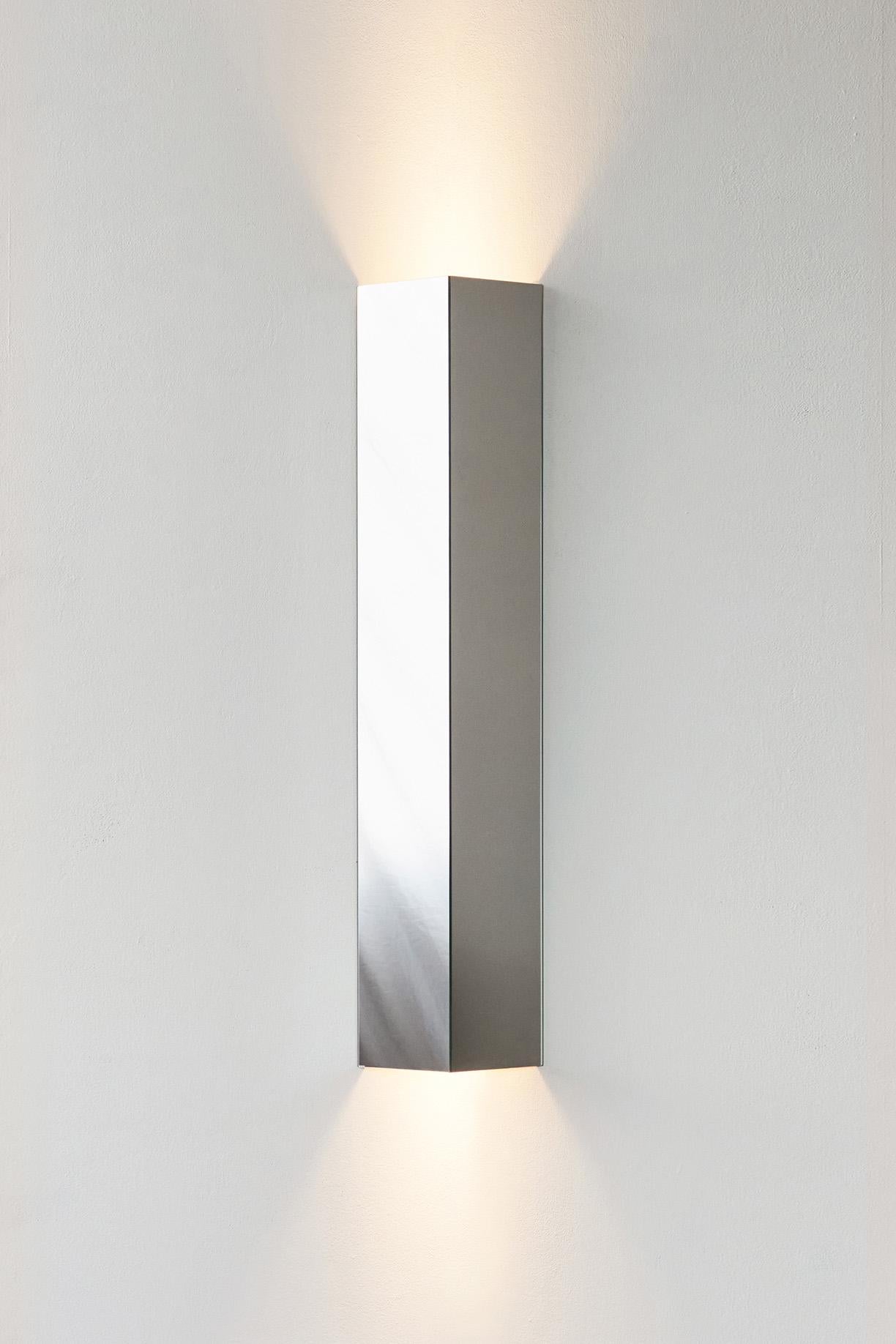 VIEW Shard Wall Sconce is part of a five-piece collection of sculptural glass and mirror furniture seeking to bring interactive views into objects and furniture.

The collection represents the belief that objects have the capacity to shift