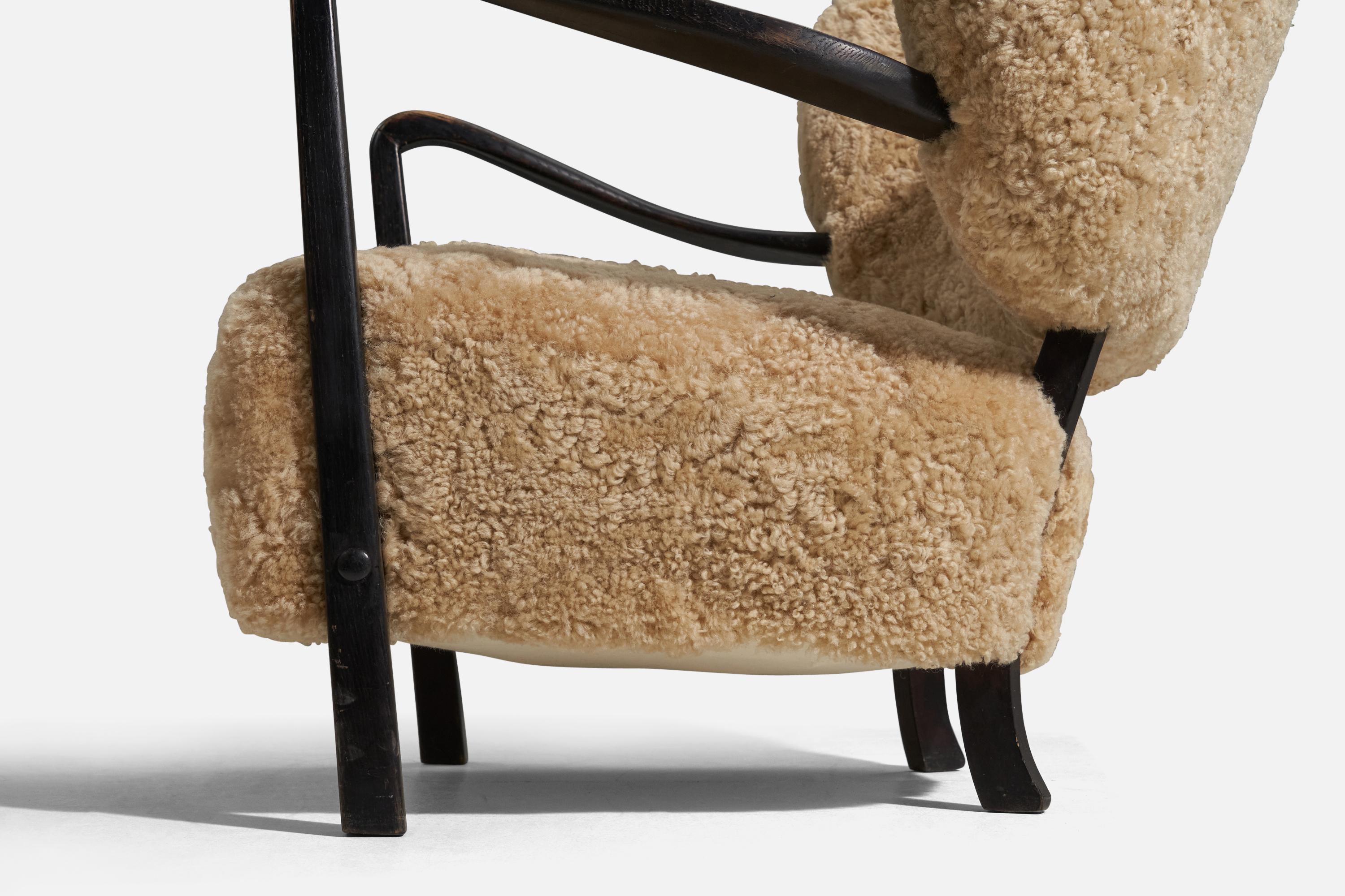 Danish Viggo Boesen 'Attributed' Lounge Chair, Stained Wood, Shearling, Denmark, 1940s